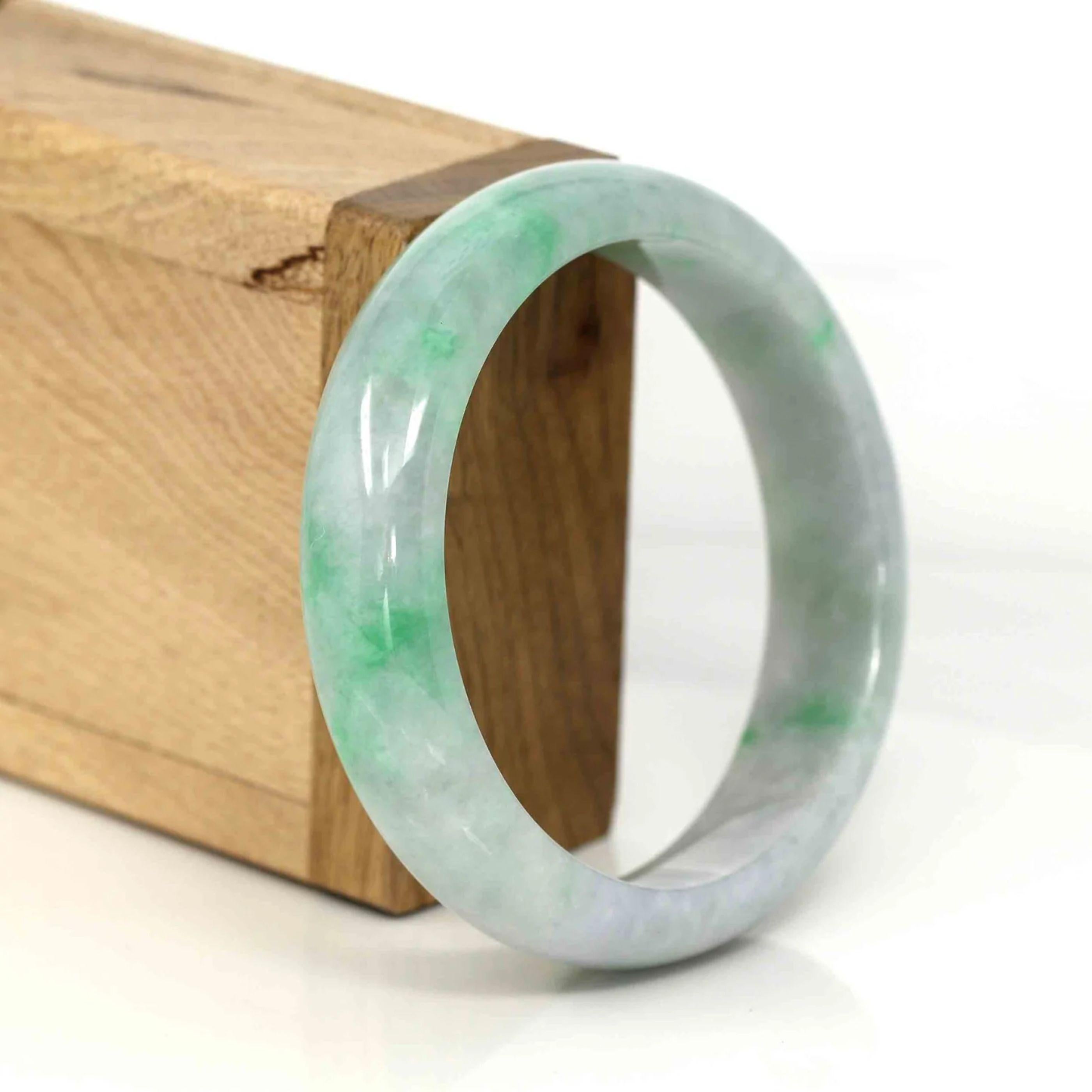* DETAILS--- Genuine Burmese Jadeite Jade Bangle Bracelet. This bangle is made with fine genuine Burmese Jadeite jade. The jade texture is very good and smooth with green-lavender color. The color is beautiful, Just has some clouds as SI Diamond.