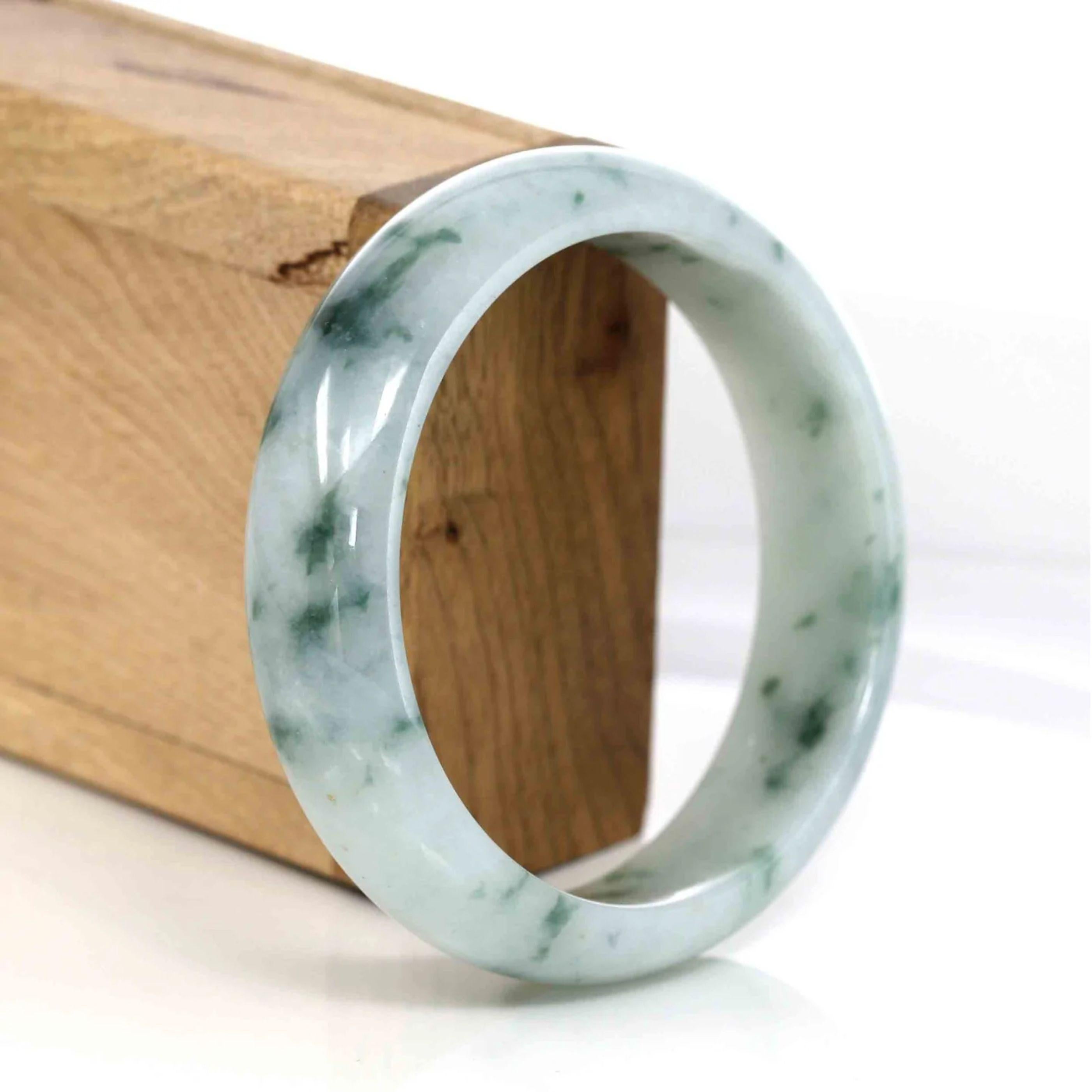 * DETAILS--This bangle is made with genuine Burmese Ice blue green Jadeite jade, The jade texture is very smooth and translucent with some blue green color inside. The blue green color looks very nice as landscape painting. It's a very unique