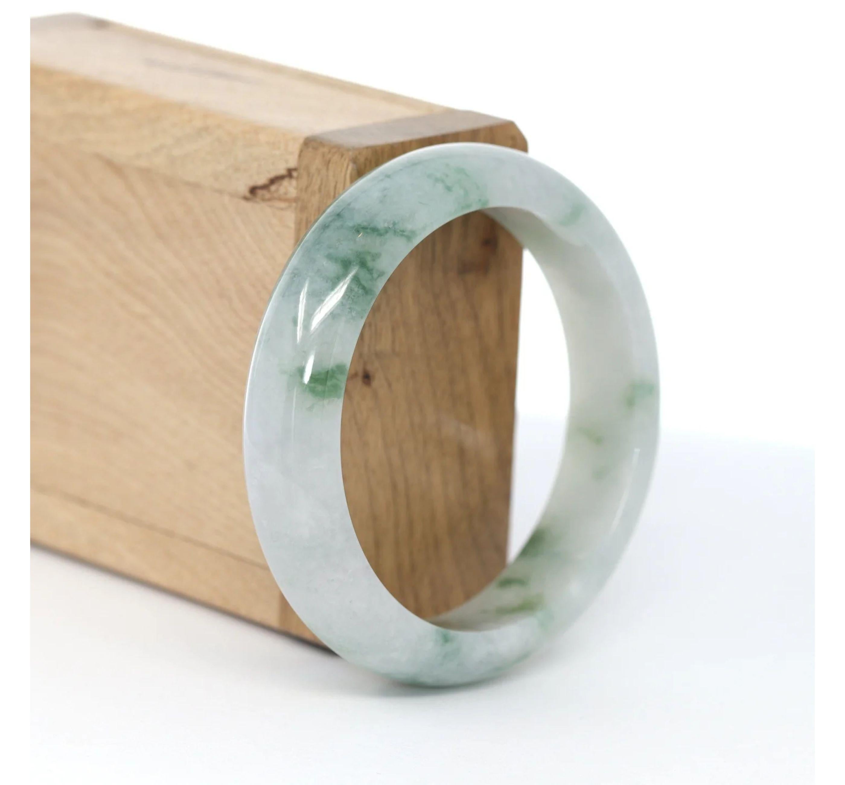 * DETAILS--- Genuine Burmese Jadeite Jade Bangle Bracelet. This bangle is made with very high-quality genuine Burmese ice-blue Jadeite jade. The jade texture is translucent and smooth with an ice blue-green color. It looks so beautiful as a
