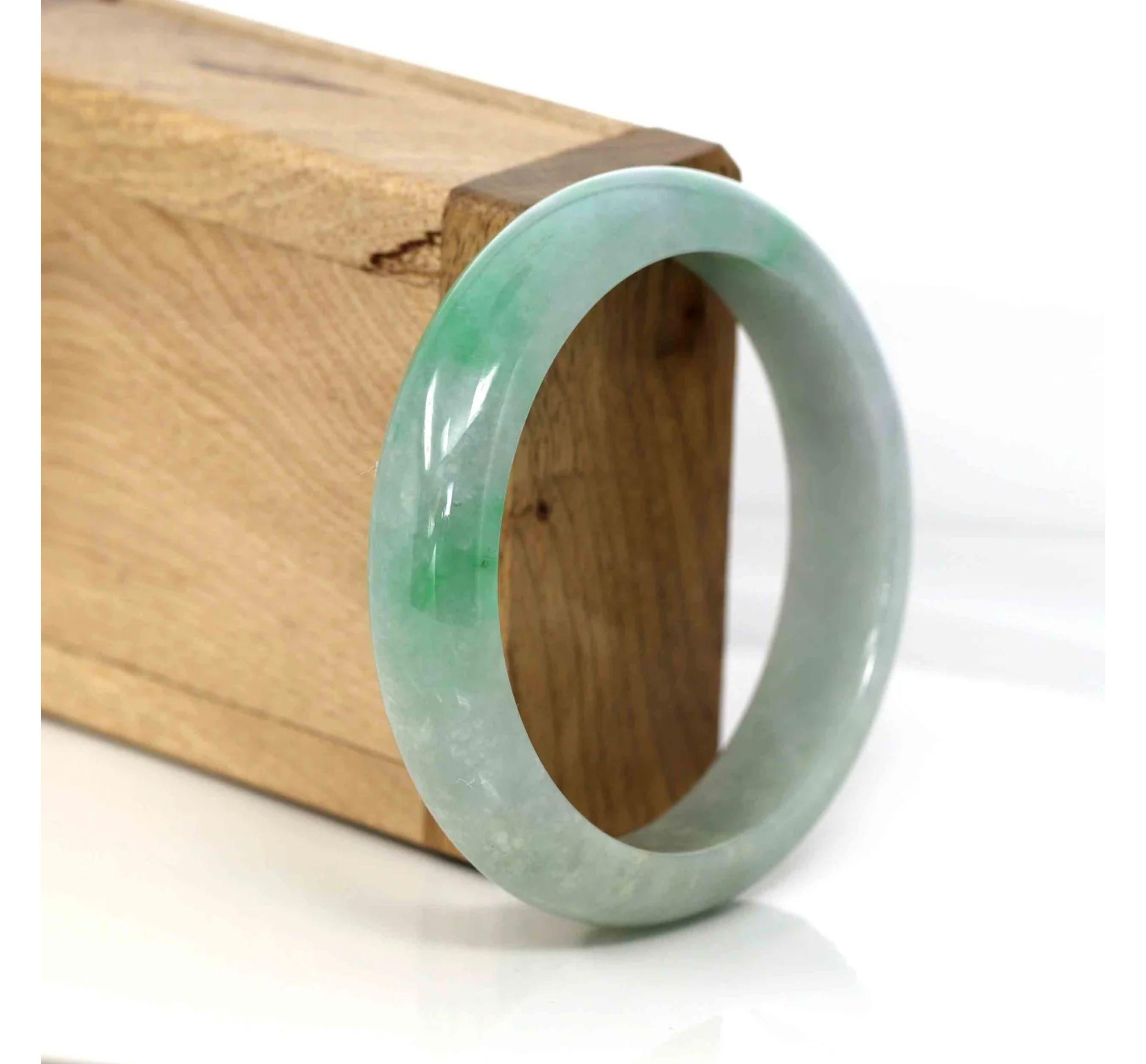 * DETAILS---This bangle is made with genuine Burmese Jadeite jade, The jade texture is smooth with green color inside. The green color looks gorgeous. Just has some natural clouds. It's a very unique bangle. You know the genuine jade bangle is