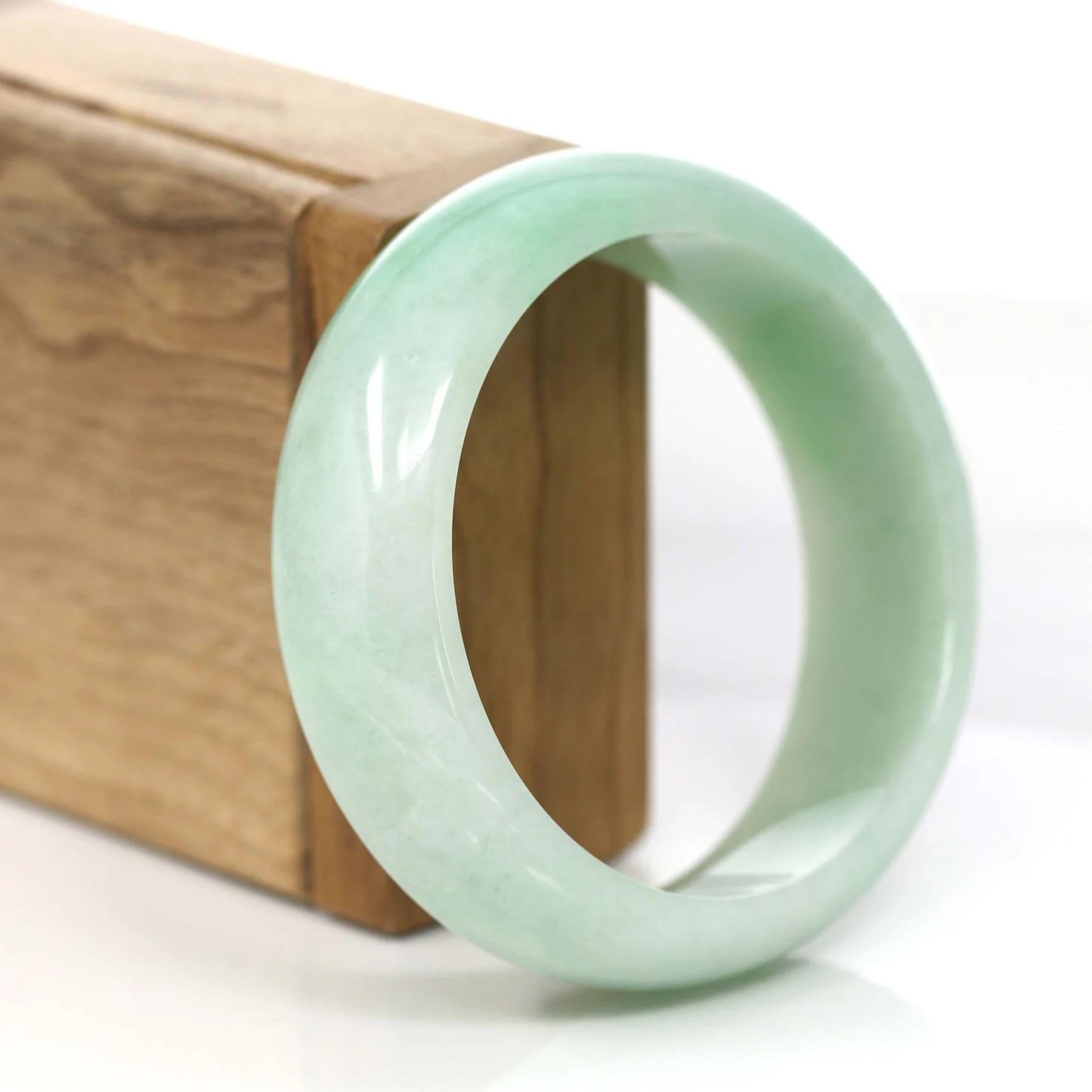 * DETAILS--- This bangle is made with very high-quality genuine Burmese Jadeite jade. The jade texture is fine and smooth with green color. It looks so beautiful in a wider size. It's a luxury gift for you and your love. It's a collectible item.

*