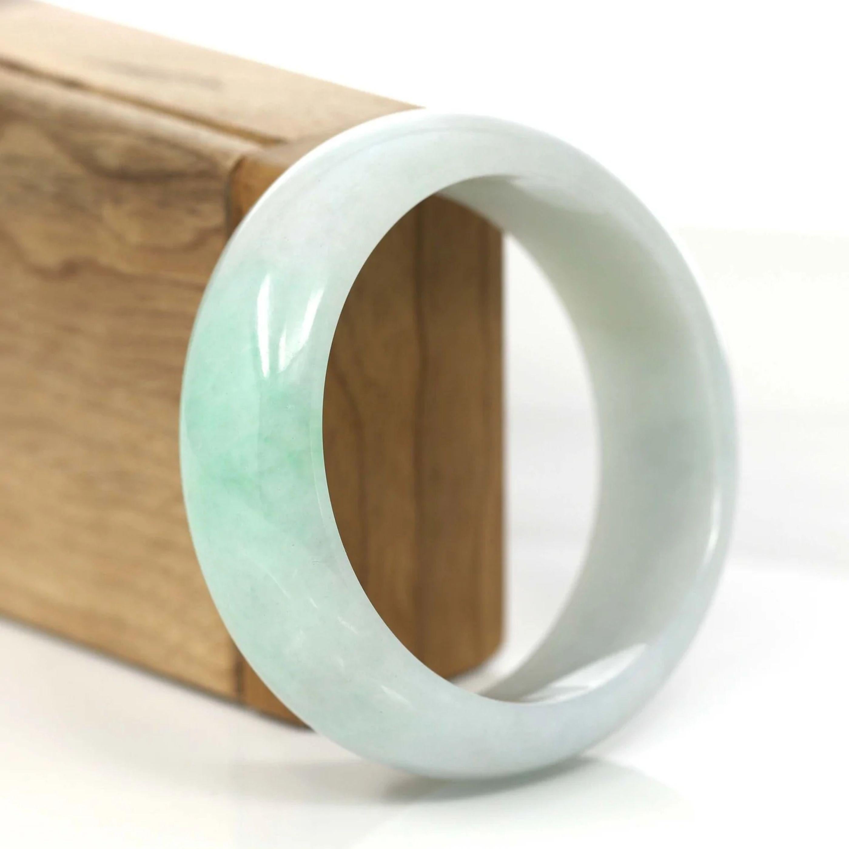 * DETAILS--- This bangle is made with very high-quality genuine Burmese Jadeite jade. The jade texture is fine and smooth with a part green color. It looks so beautiful and clean in a wider size. It's a luxury gift for you and your love. It's a