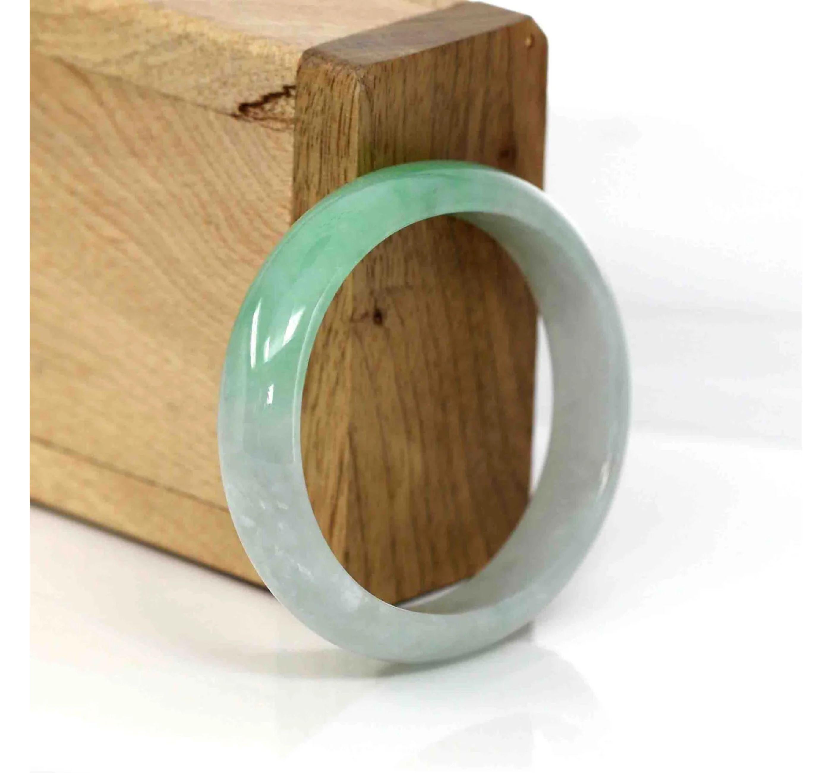 * * DETAILS--- This bangle is made with Burmese ice green jadeite jade. The jade texture is very translucent and smooth. This bangle is made with old mine.  It's an princess oval style for a lovely small wrist. You know the genuine jade bangle is