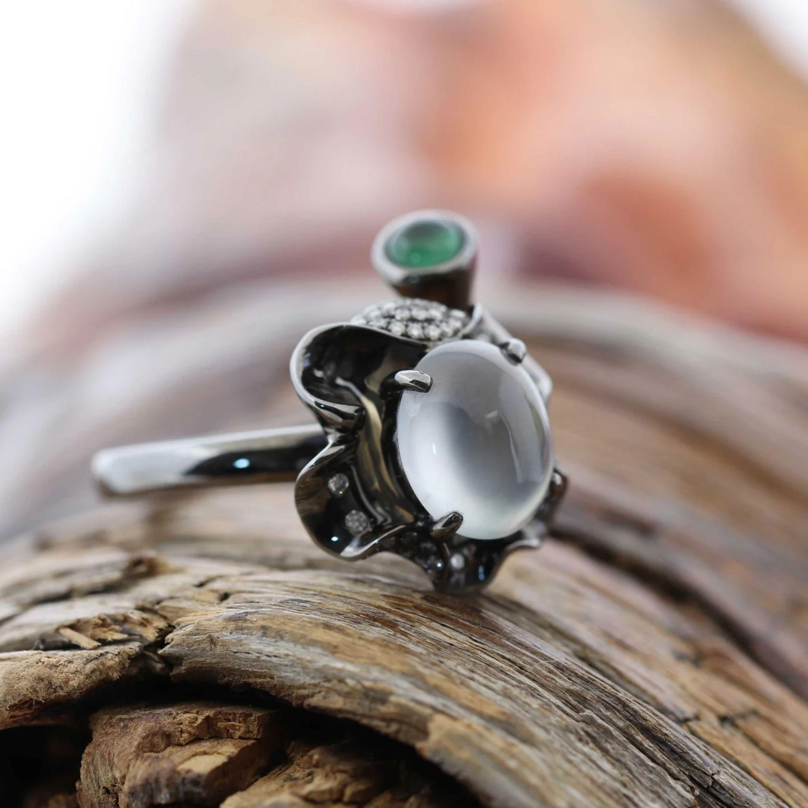 * UNIQUE DESIGN --- Inspired by the natural beauty of genuine Burmese Imperial Green Jadeite, the rich, beautiful apple green color is found on no other stone. This one of a kind engagement ring combines the natural beauty of the extremely rare gem