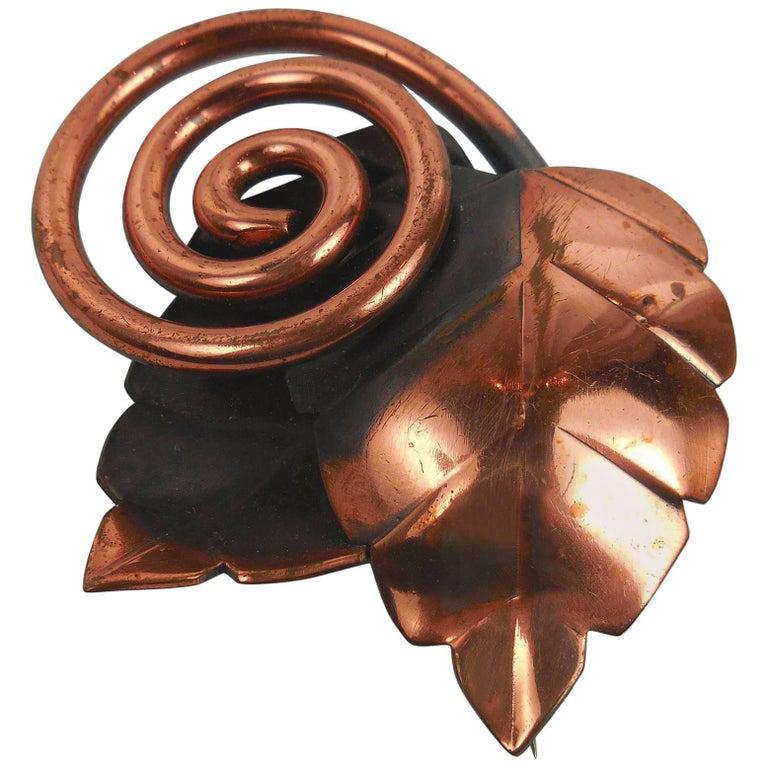 copper brooches