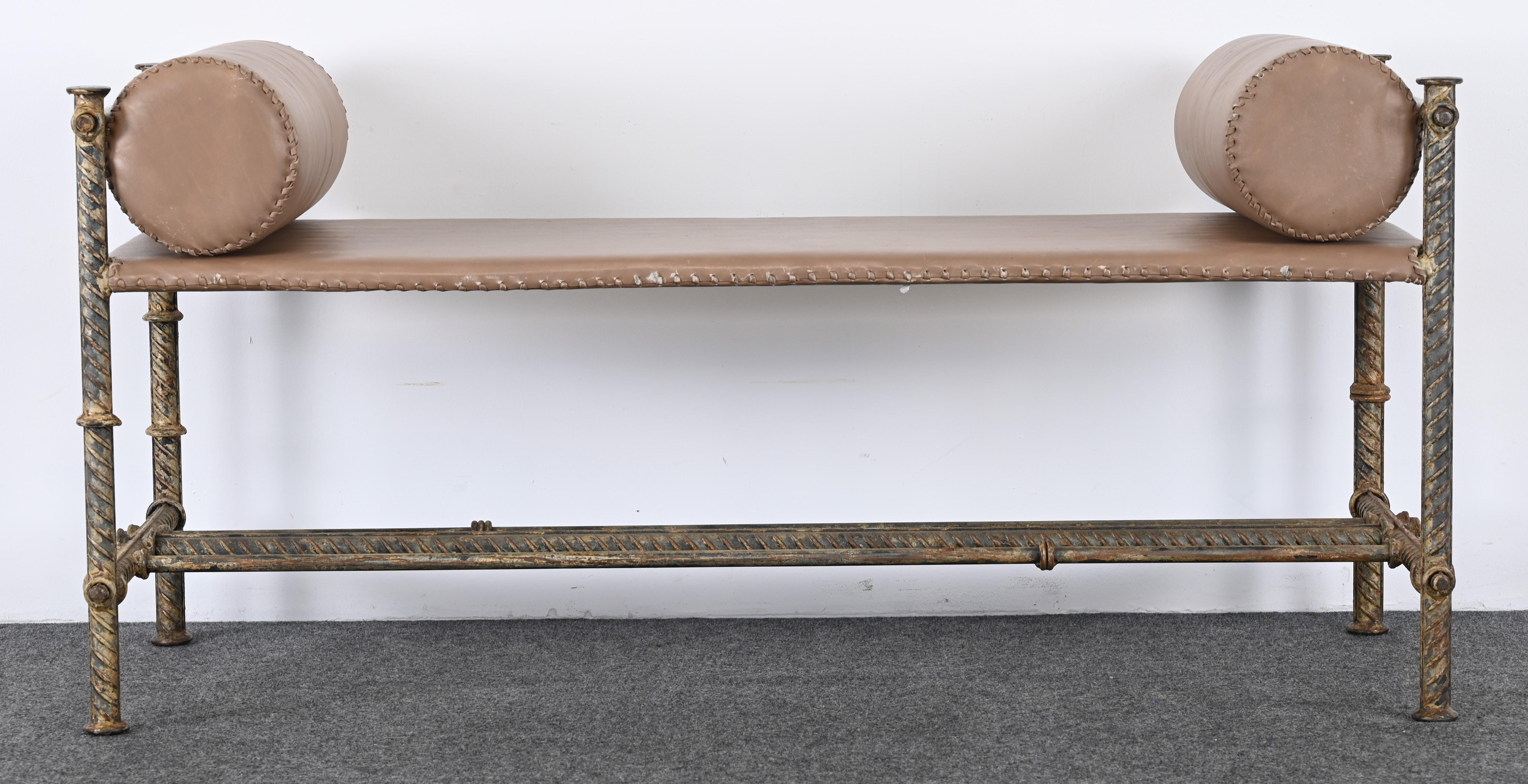 A handsome steel rebar bench with leather seats and bolsters. This bench has an industrial feel to the design but also mimics other artists of the era, such as Diego Giacometti, Tom Corbin, and others. The bench is covered in leather with a cowboy