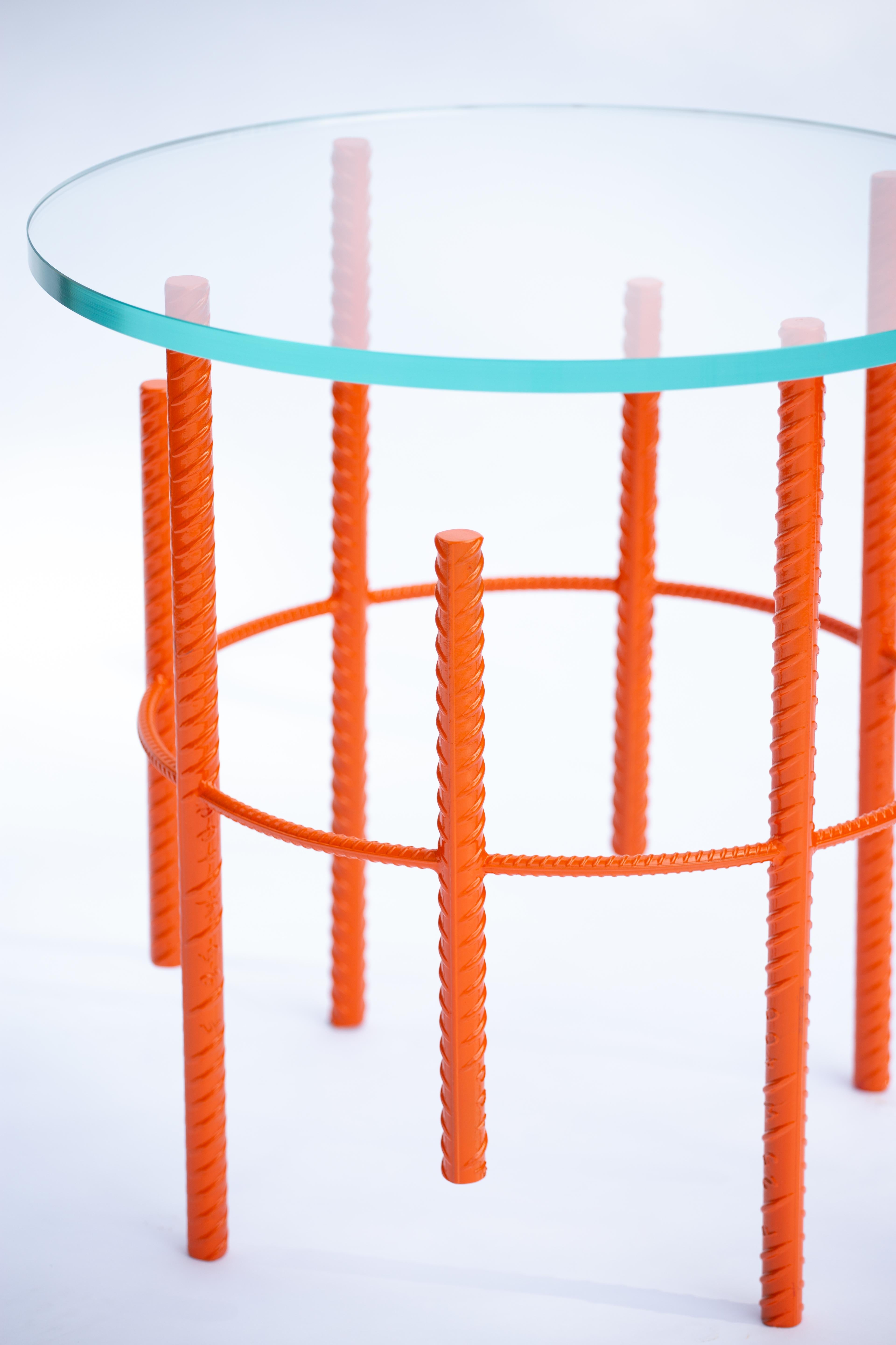Handcrafted by Troy Smith from Troy Smith Studio. The base is made from one-inch construction rebar and carefully welded together to form a sputnik space-like form. The base is powder coated in coral orange. (Custom colour options are available on
