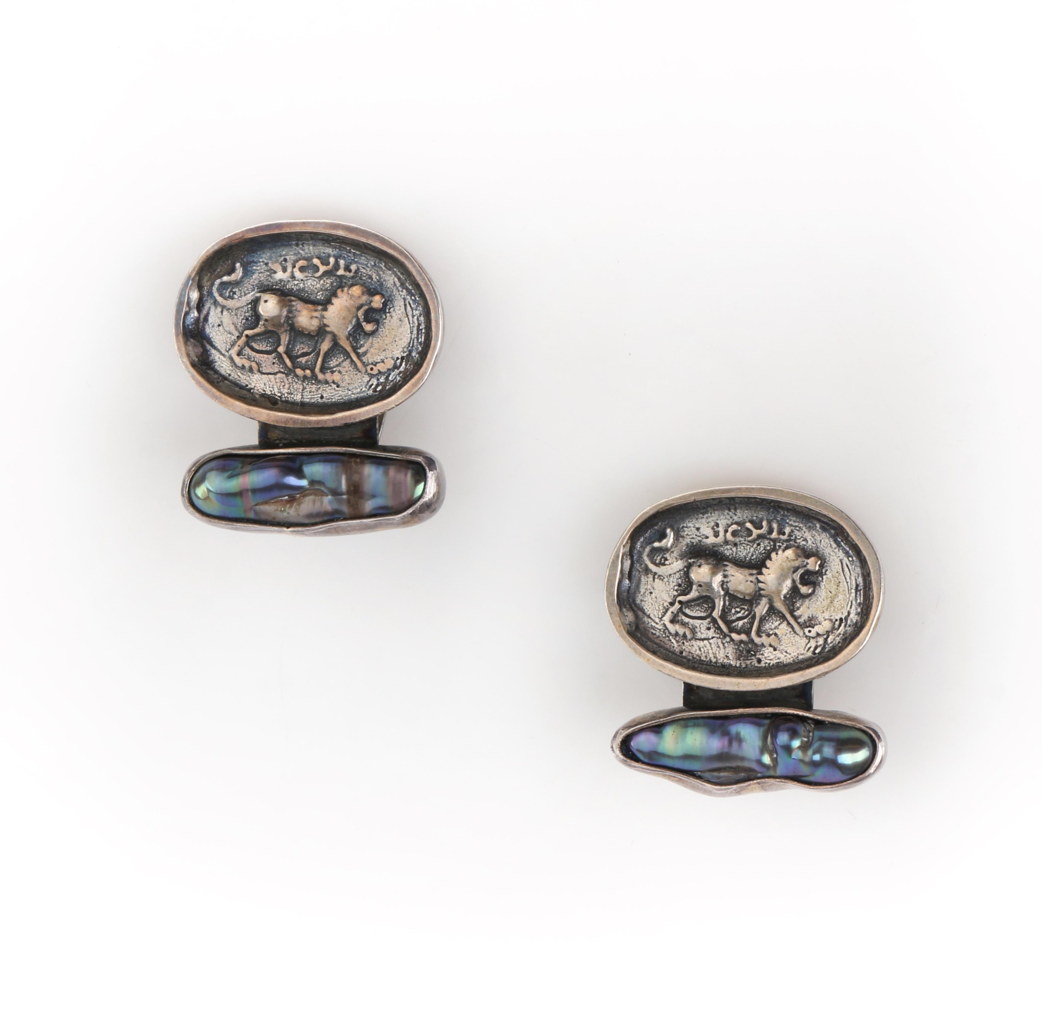 One of a Kind: REBECCA COLLINS Sterling Silver Ancient Coin Biwa Pearl Stone Clip On Earrings
 
Brand / Manufacturer: Rebecca Collins 
Style: Clip-on earrings
Color(s): Shades of silver (metal); shades of grey, blue, purple (biwa pearl)
Marked