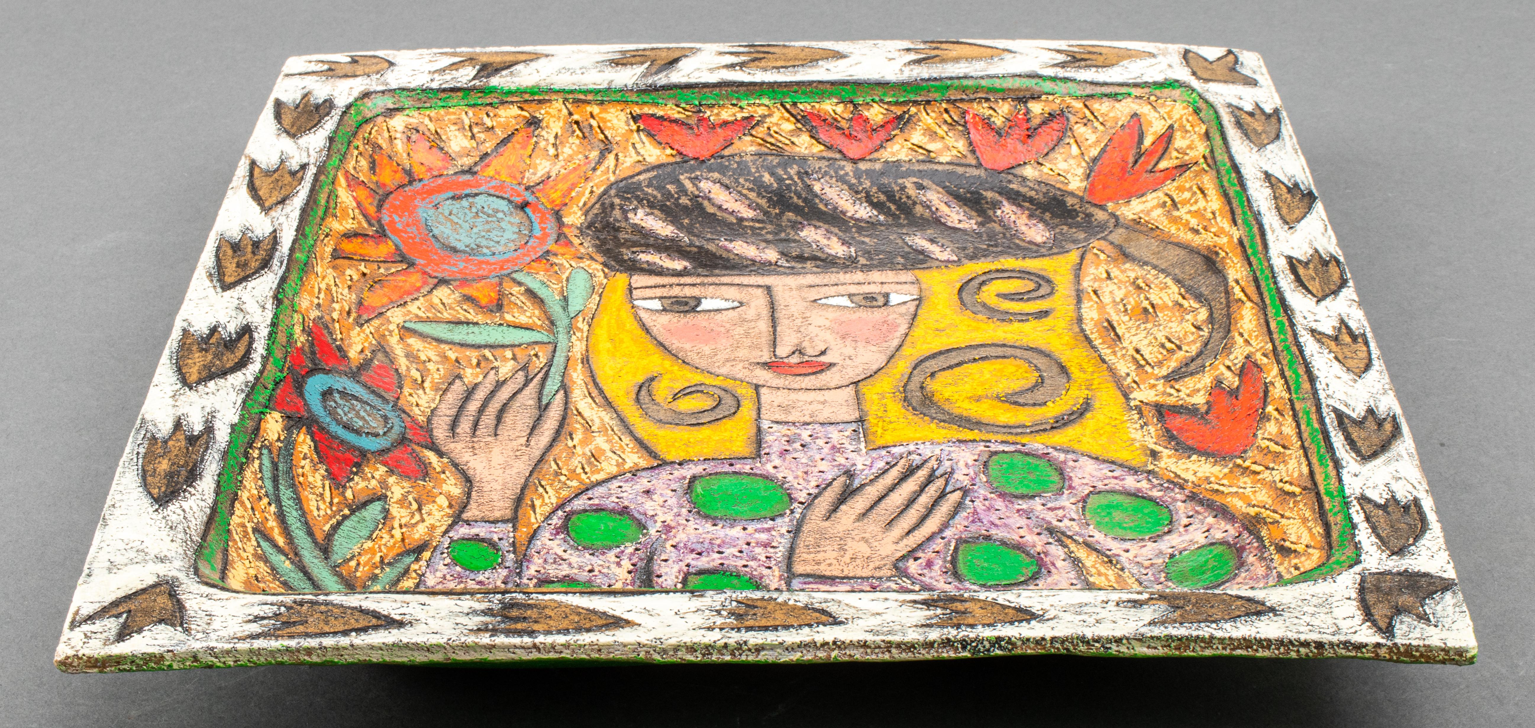 Rebecca cool and Ross Miller (Australian, XX-XXI) ceramic pottery platter with incised and hand-painted folk art decoration depicting a blond woman wearing a hat and holding a sunflower, signed 