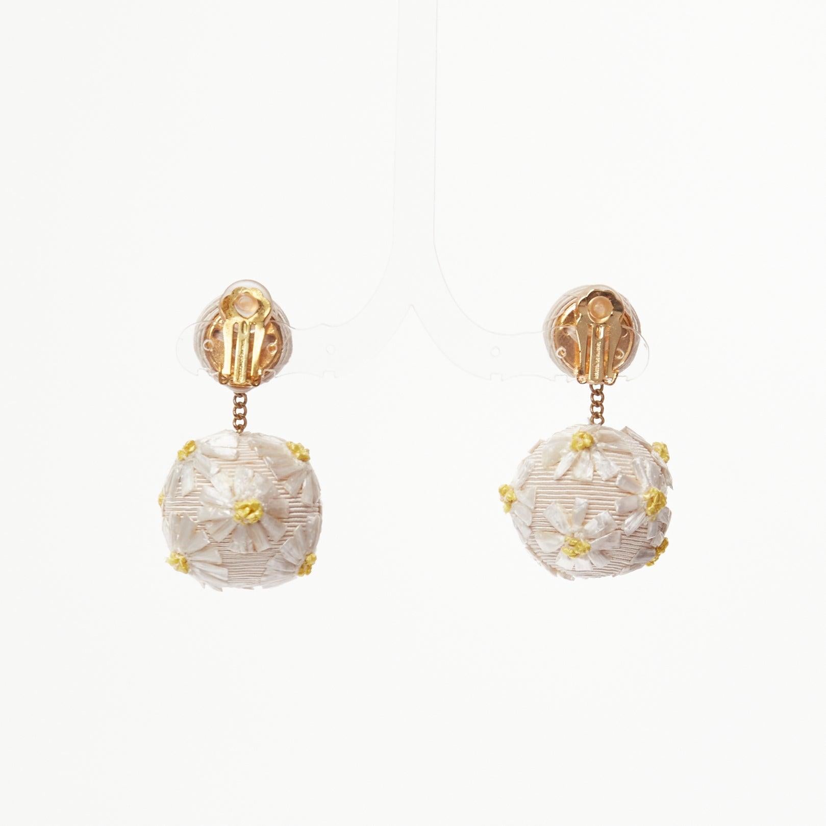 REBECCA DE RAVENEL cream yellow daisy applique clip on drop earrings For Sale 1