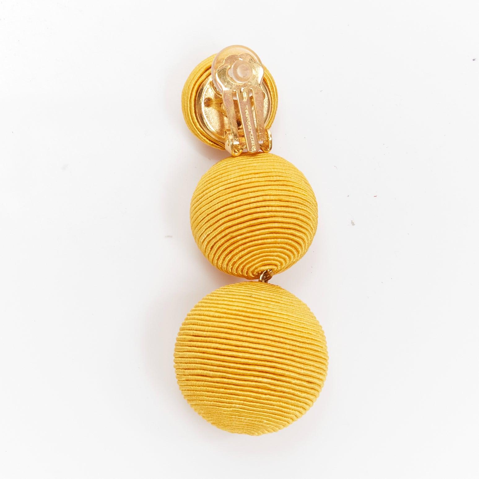 Women's REBECCA DE RAVENEL yellow trio balls dangling clip on earrings Pair