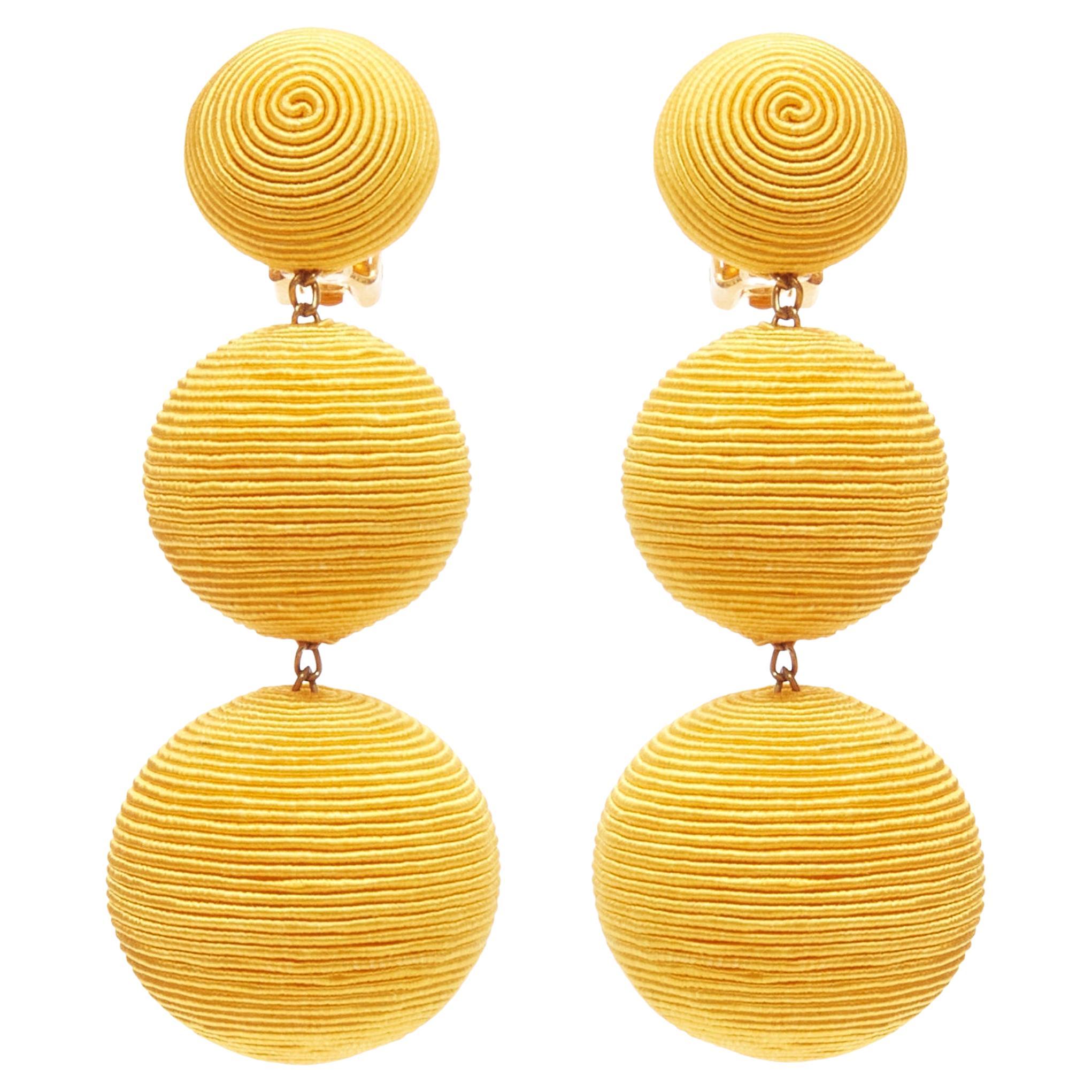 REBECCA DE RAVENEL yellow trio balls dangling clip on earrings Pair