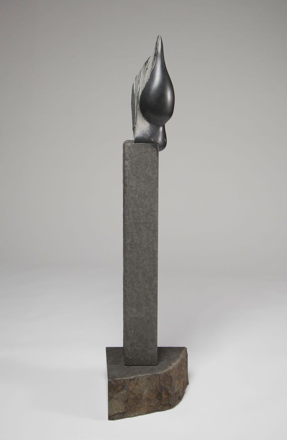 In Rebecca Johnson's stone sculpture “Aquifer,” two lusciously polished basalt raindrops stand perched at the edge of the tall base as if ready to fall off, leaving behind only dryness.

Inspired by the parched Northern California climate, the
