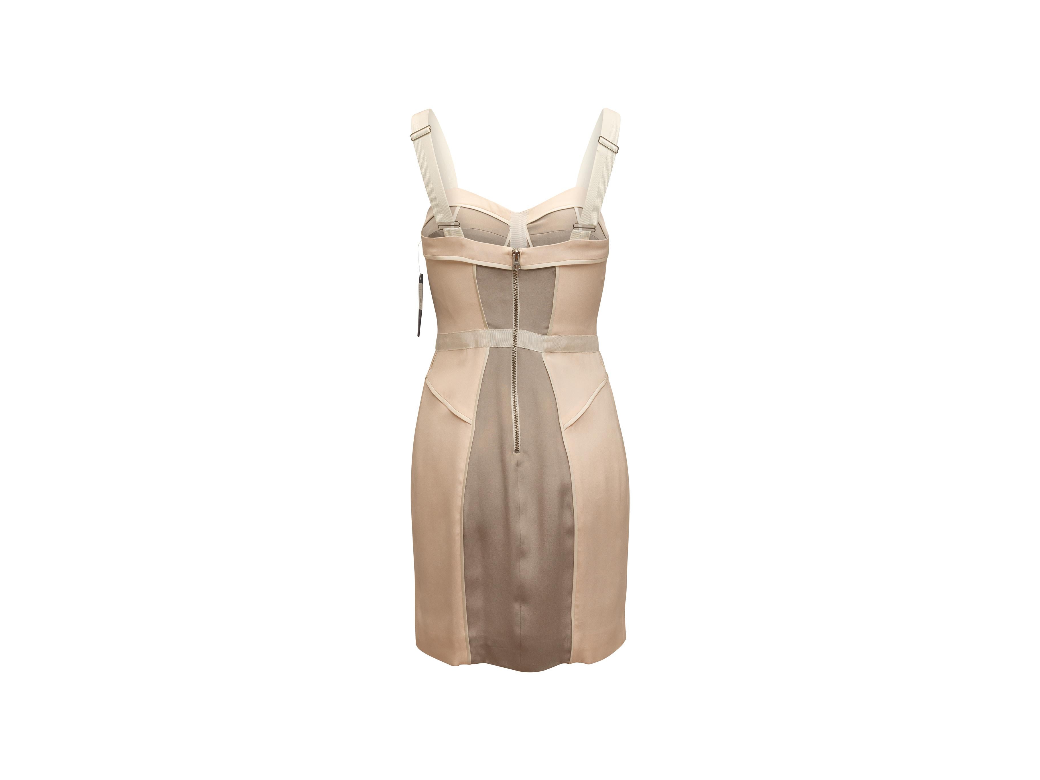 Product details: Beige and taupe sleeveless bustier mini dress by Rebecca Minkoff. Sweetheart neckline. Adjustable straps. Grosgrain trim. Zip closure at center back. 30