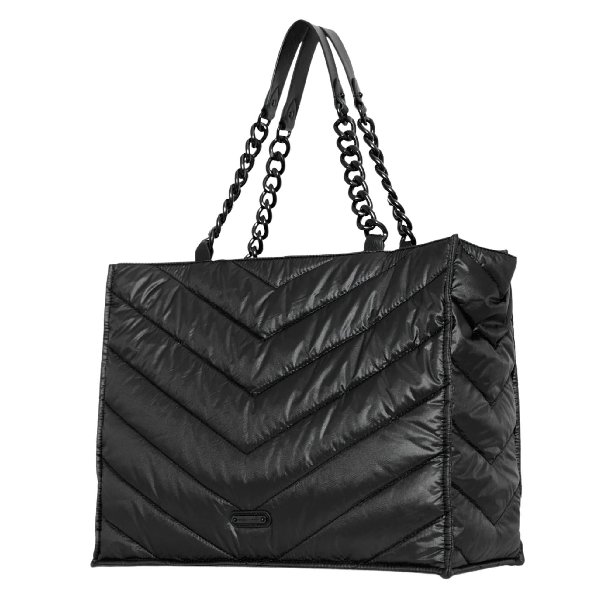 An icon in the making. Our latest addition to join the Edie family is distinguished by its chevron quilted pattern and black shellac chain shoulder straps. Crafted from ultra-lightweight nylon, it has a front exterior slip pocket for keeping small