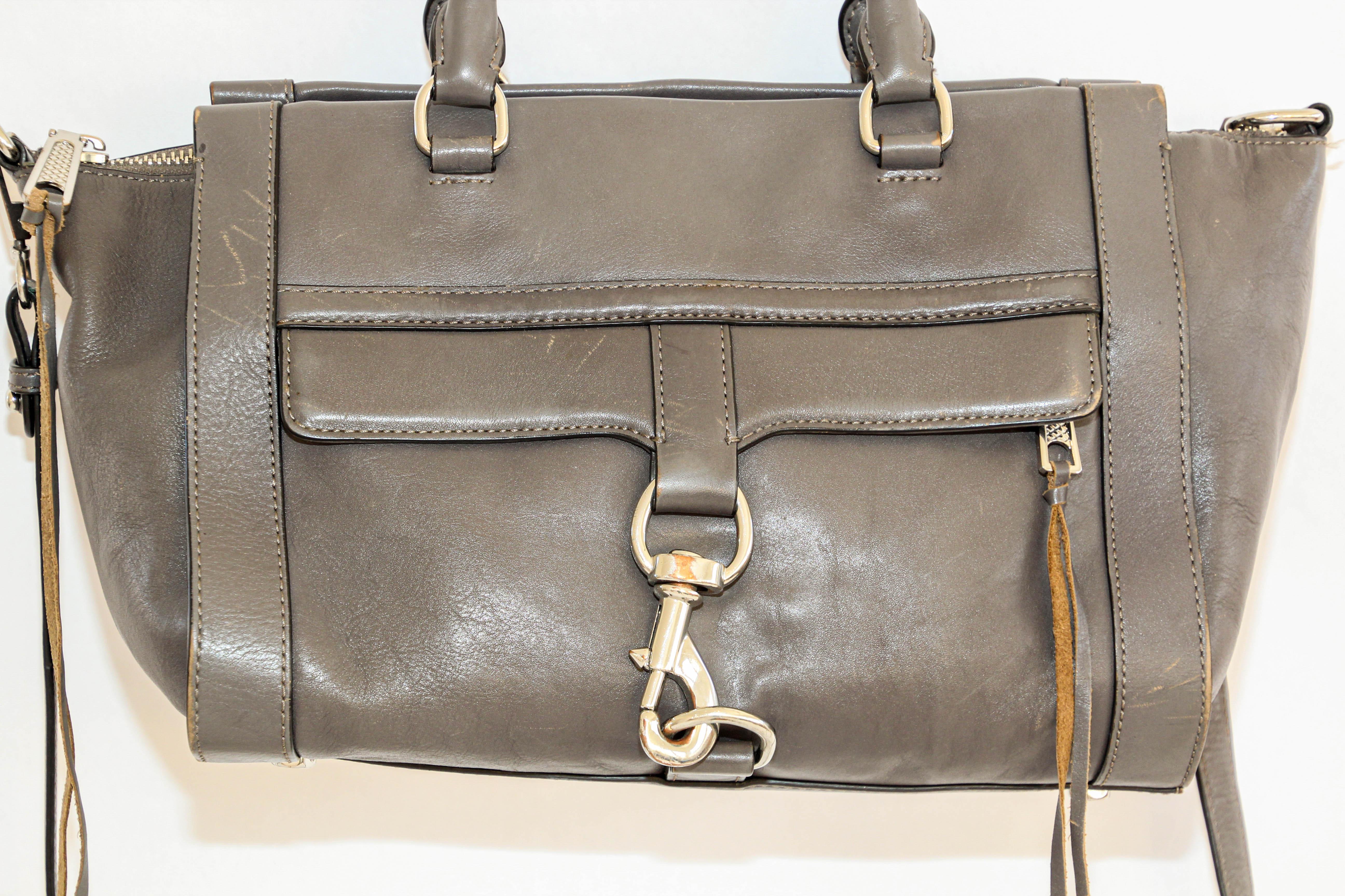 Rebecca Minkoff Large Grey Leather Bag Bowery Satchel.
Made from a genuine leather, the Rebecca Minkoff Bowery satchel features a detachable shoulder strap with twin grab handles. The leather satchel has a top zip fastening which conceals a
