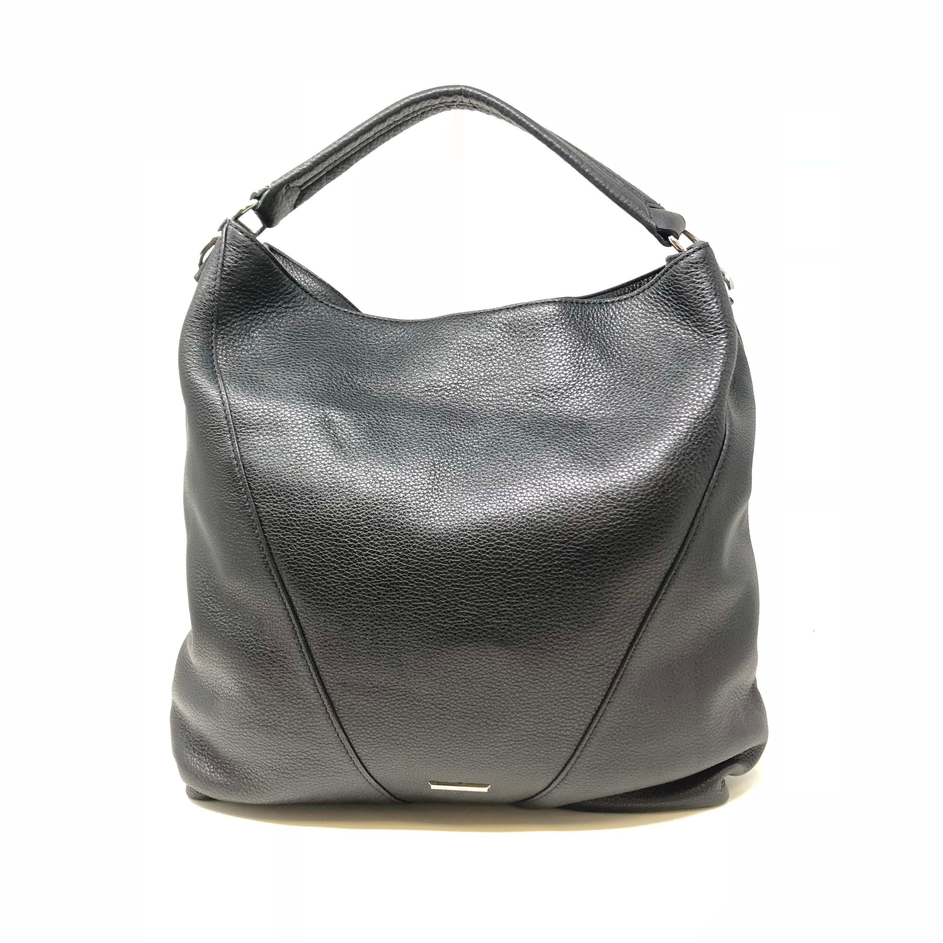 Slouchy and accented with leather tassels, this hobo bag is both super chic and versatile. It's roomy enough for all your work and gym essentials, but won't look out of place at dinner.

Genuine leather
15.5