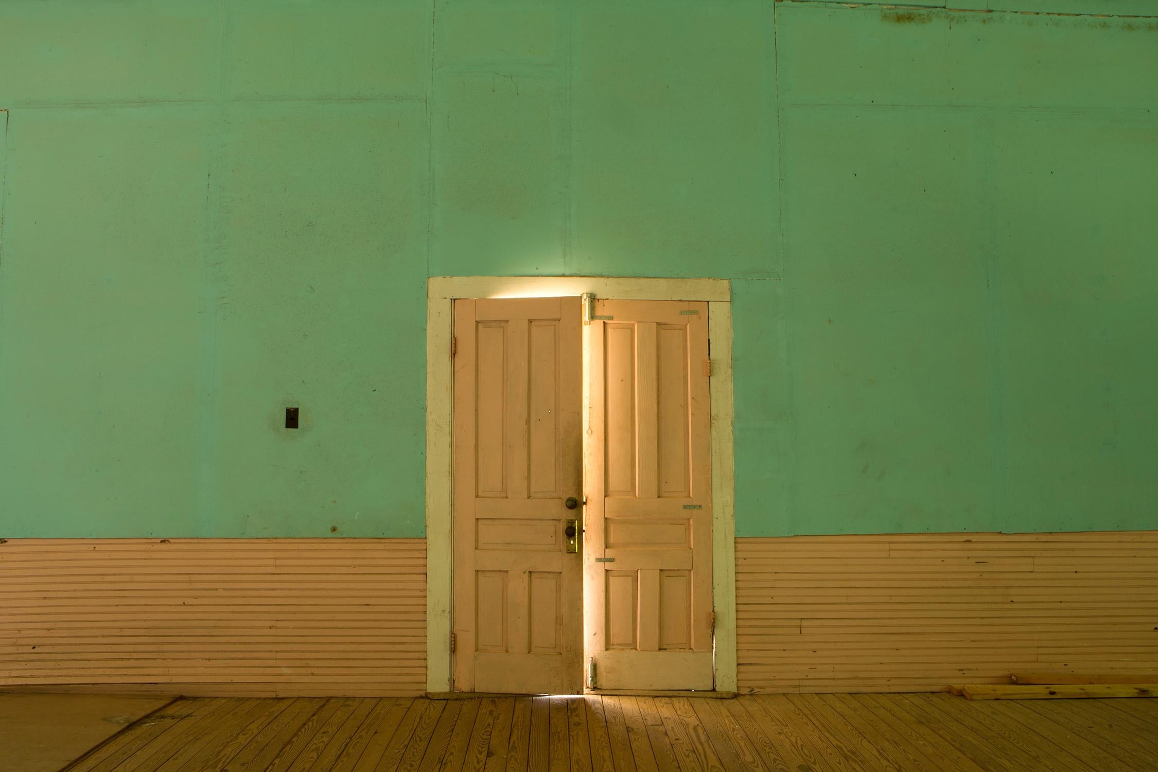 Rebecca Skinner Color Photograph - "Anticipation", contemporary, interior, church, doors, green, color photograph