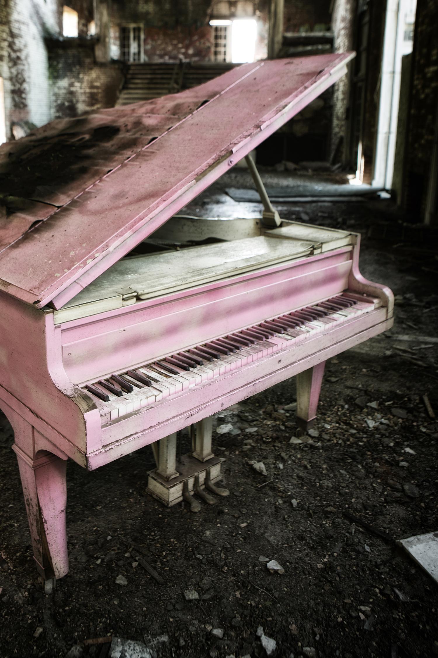 Rebecca Skinner’s “Concluded” is a 18 x 12 inch metal print of an abandoned pink piano located in the remnants of an auditorium in Indiana. We can only imagine the music that once played in this beautiful forgotten structure. The frameless print has