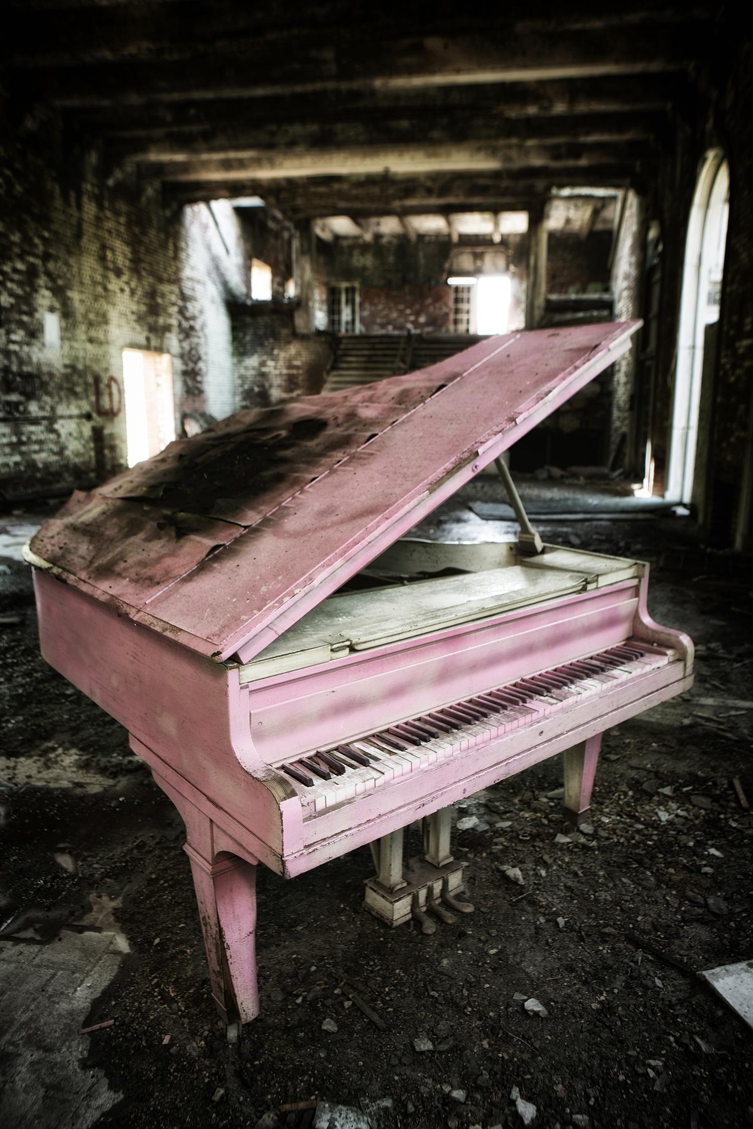 "Concluded", contemporary, abandoned, piano, pink, music, color photograph - Photograph by Rebecca Skinner
