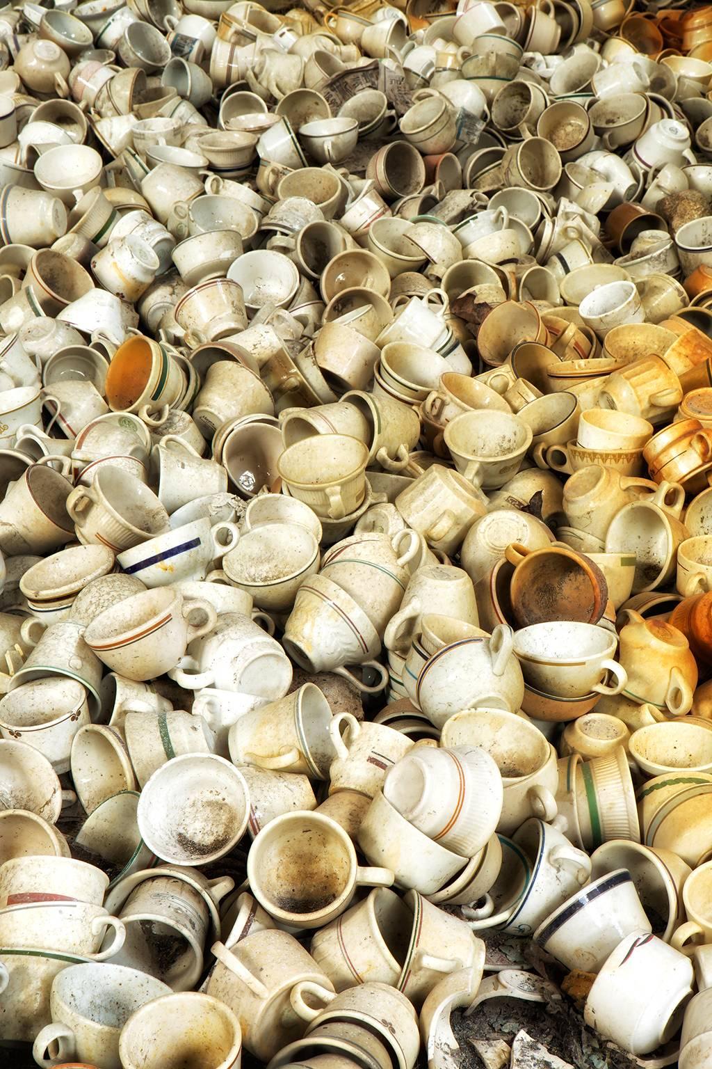 Rebecca Skinner Still-Life Photograph - "Crowded", abandoned, china, factory, cups, industry, metal print, color photo