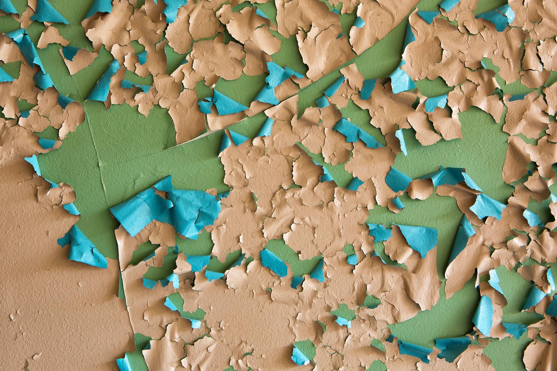 "Crumbling", abstract, peeling paint, green, blue, peach, color photograph - Photograph by Rebecca Skinner