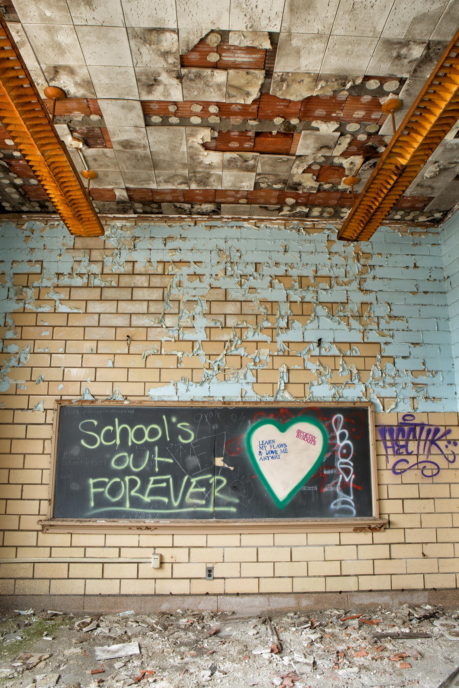 Rebecca Skinner Color Photograph - "Disorderly", abandoned, school, graffiti, chalkboard, blue, color photograph