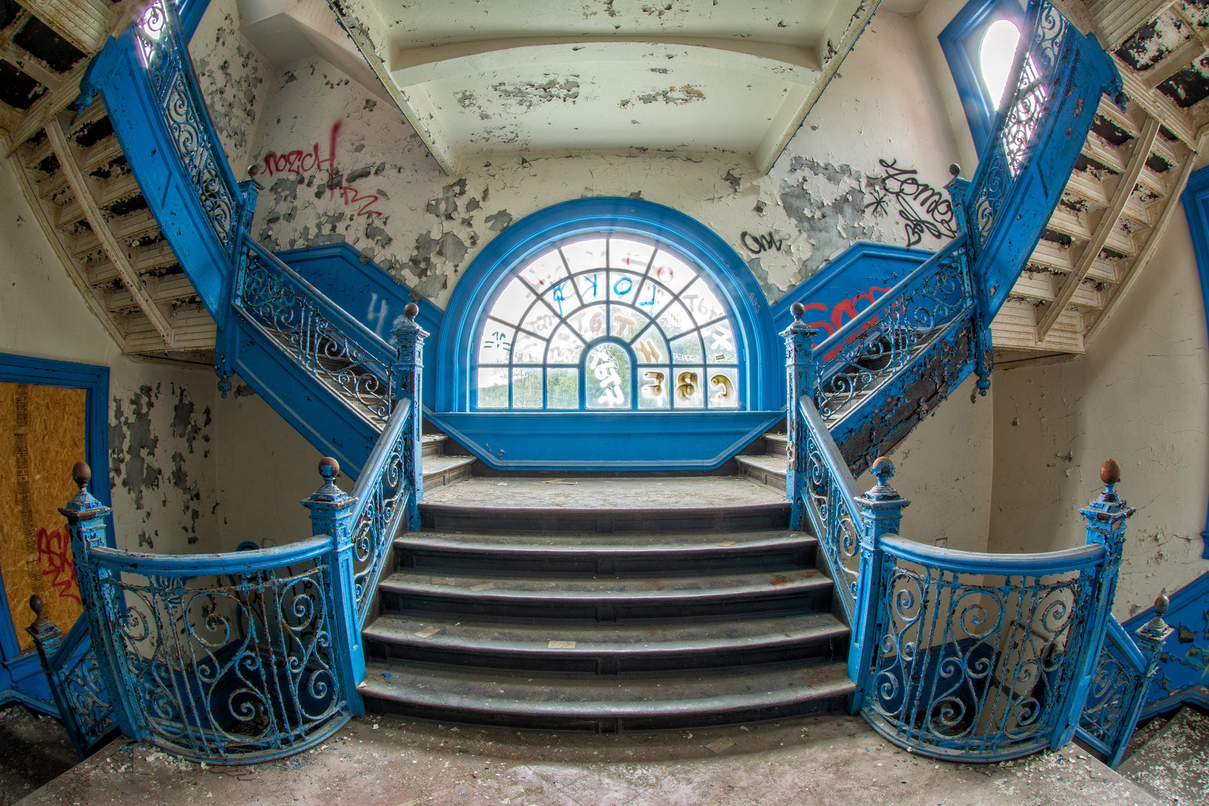 Rebecca Skinner Color Photograph - "Faded Footsteps", contemporary, school, blue, iron, stairs, photograph