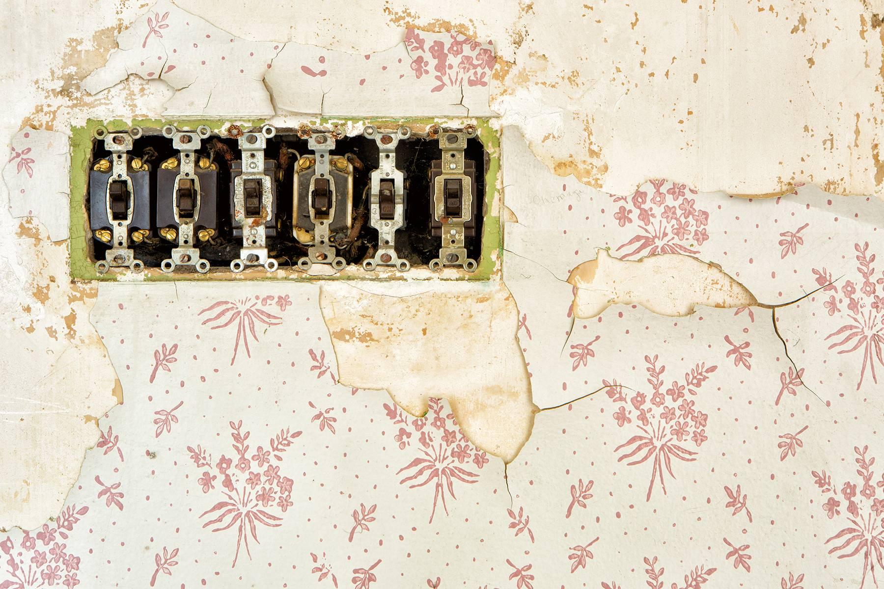 "Fading", color photo, wallpaper, switches, electrical, pink, beige, vintage - Photograph by Rebecca Skinner