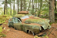 "Incapacitated", contemporary, antique car, landscape, green, color photograph
