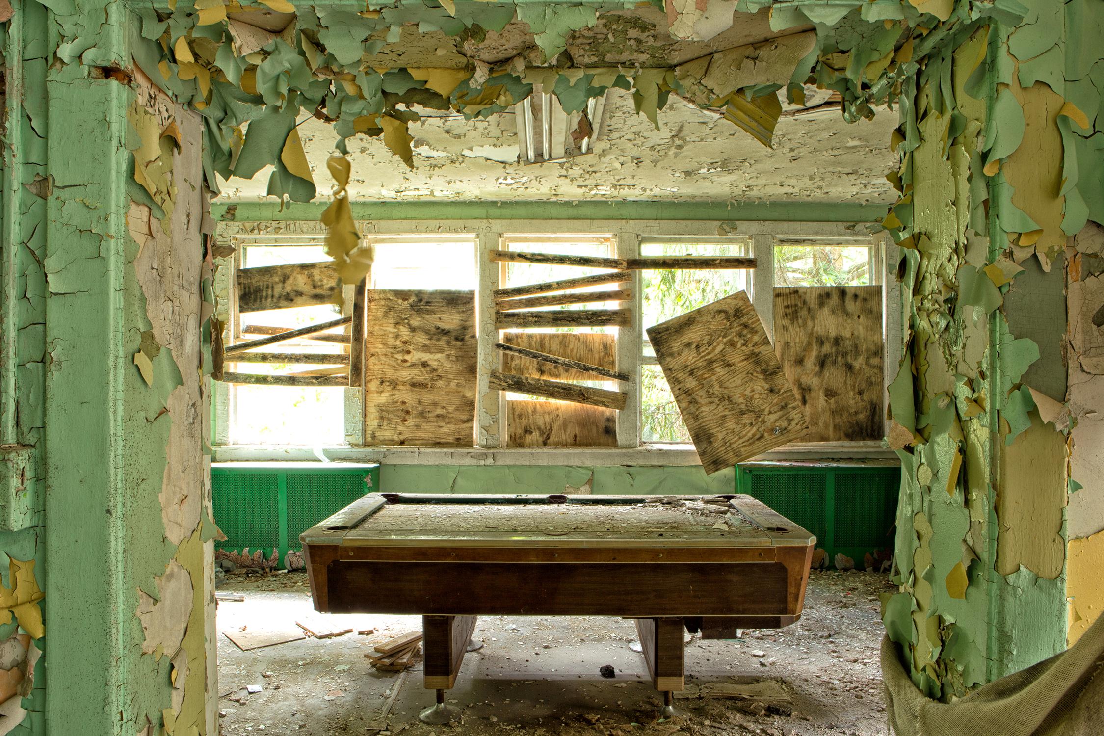 "Outward", abandoned, pool table, peeling paint, interior, green, photograph - Photograph by Rebecca Skinner