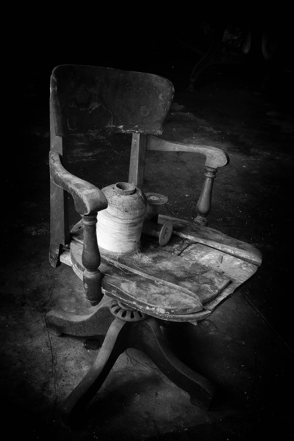 Rebecca Skinner Still-Life Photograph - "Rest", contemporary, black, white, silk mill, industrial, chair, photograph