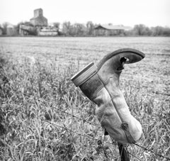 "Sorrow", Contemporary Landscape, Cowboy Boot, Fence, Black and White Photograph