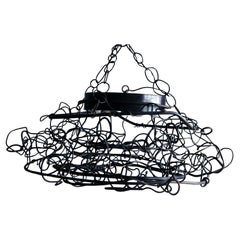 Lampadario in acciaio saldato Rebecca Welz