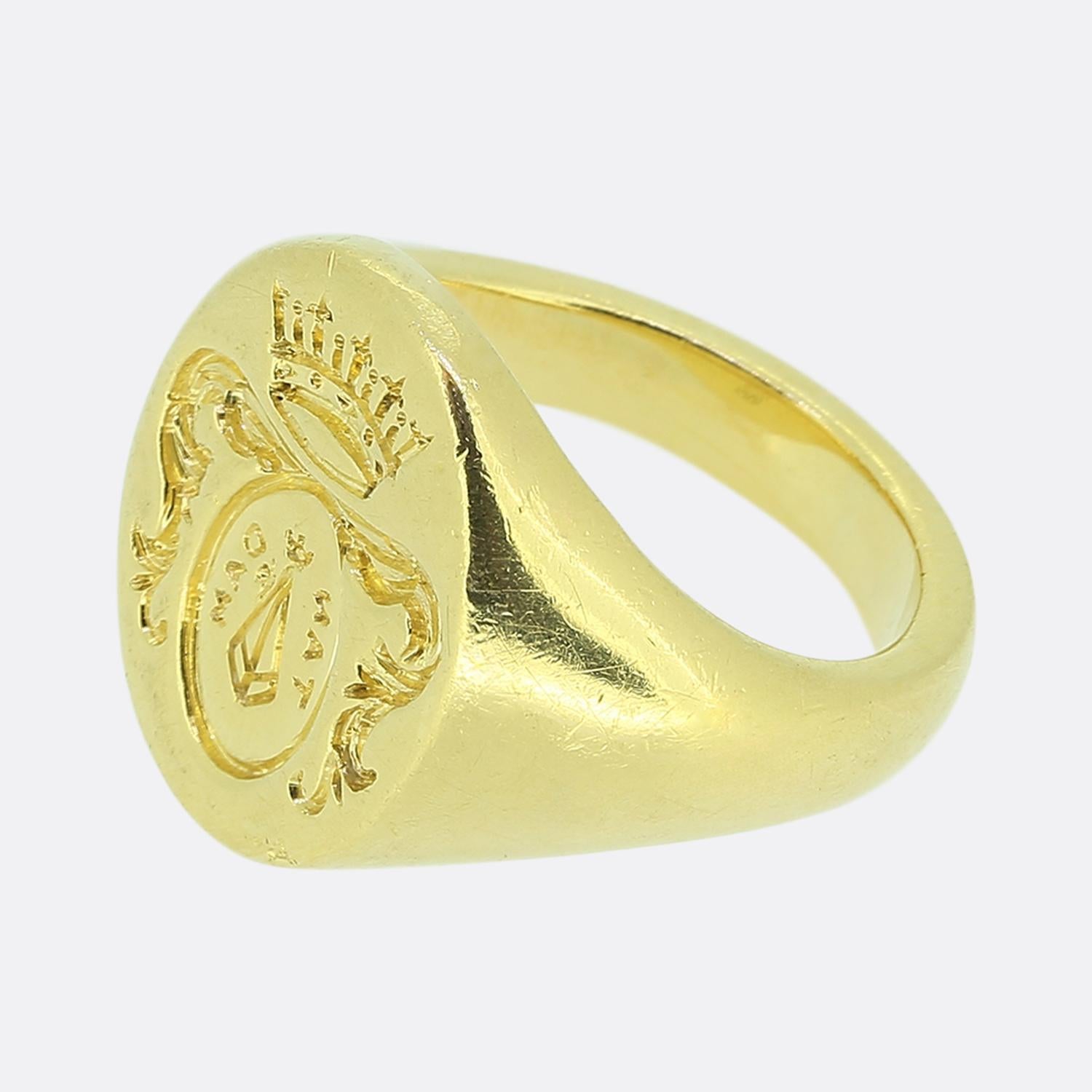 Here we have a classically styled 18ct yellow gold signet ring from signet ring specialists, Rebus. This oval shaped piece showcases a finely detailed deep intaglio coat of arms with curvaceous decoration and crown atop.

Condition: Used