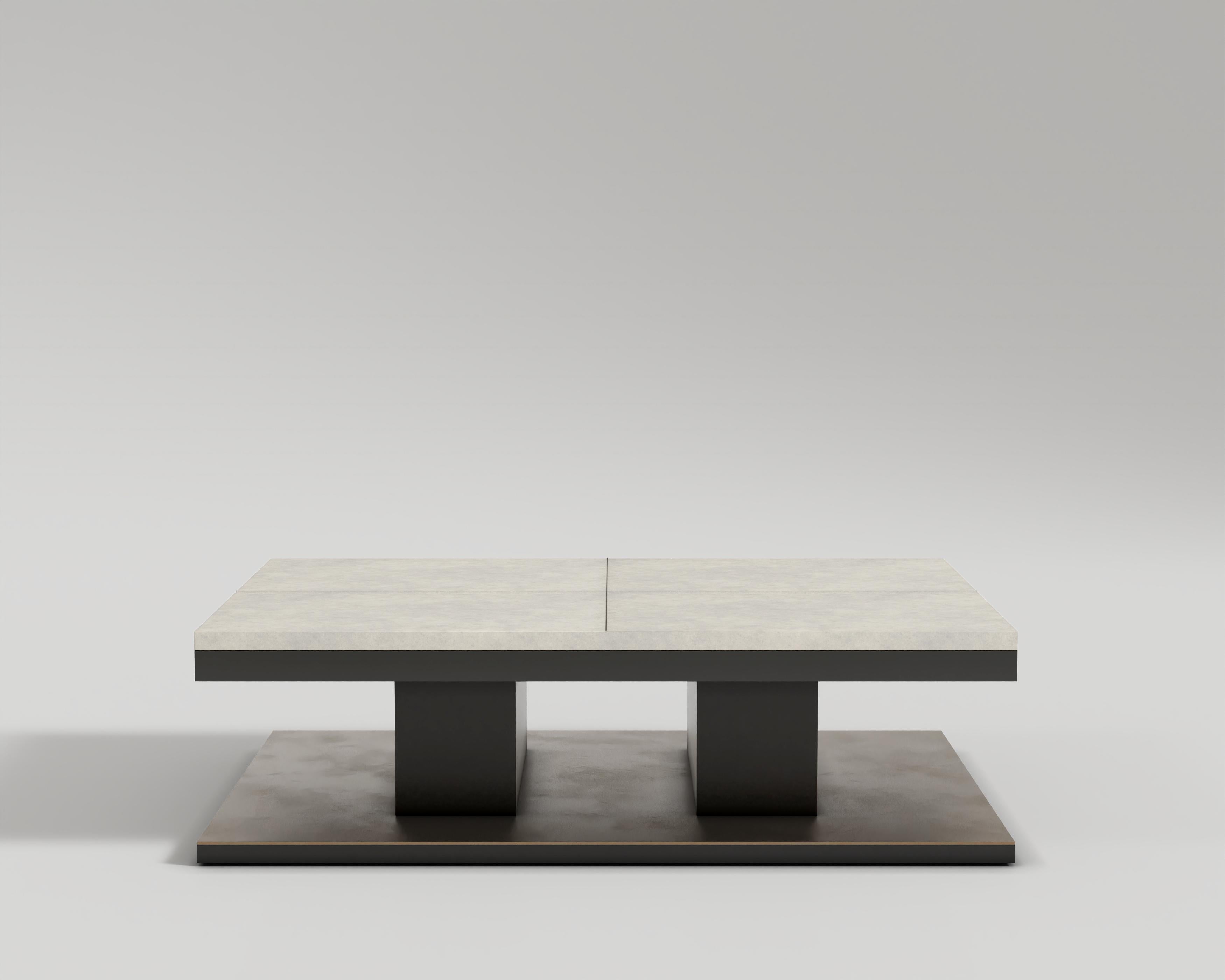 Rec Coffee Table
The Rec coffee table showcases a striking design with a matte black metal body and a tabletop crafted from luxurious white goat skin. The matte black metal exudes a modern and edgy vibe, providing a sturdy and durable foundation for