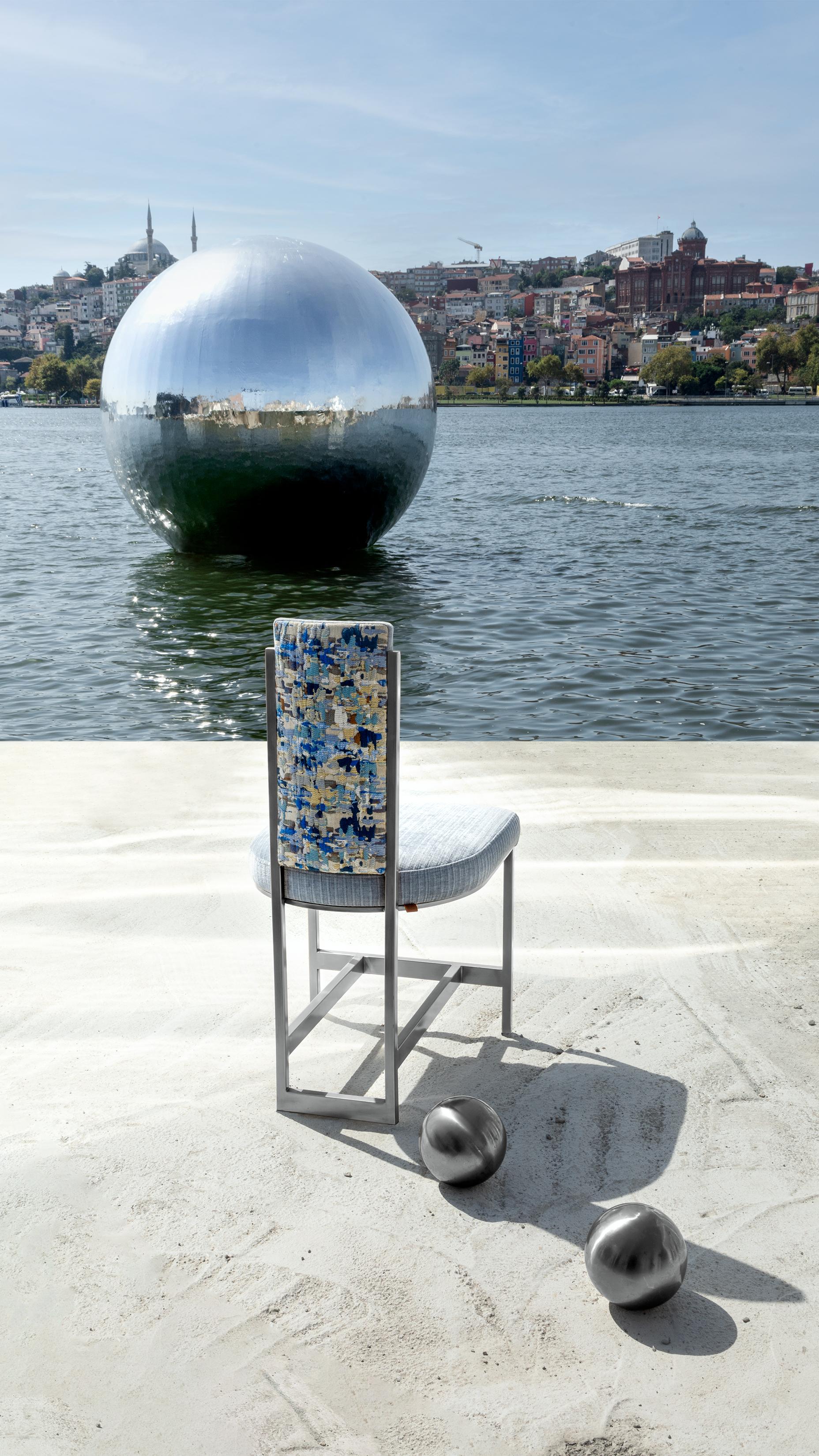 This Kenzo blue chair combines your admiration for antiquity with its aesthetic form and practical comfort. Made with high-quality materials, this chair is designed to provide durability for many years to come.

With its unique style and elegant