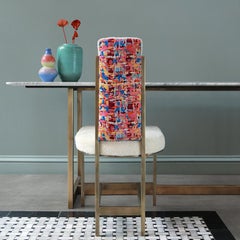 Richiamata la sedia Kenzo rosa e Teddy bianco in ottone