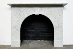 Reclaimed 19th Century arched Victorian Carrara marble fireplace surround