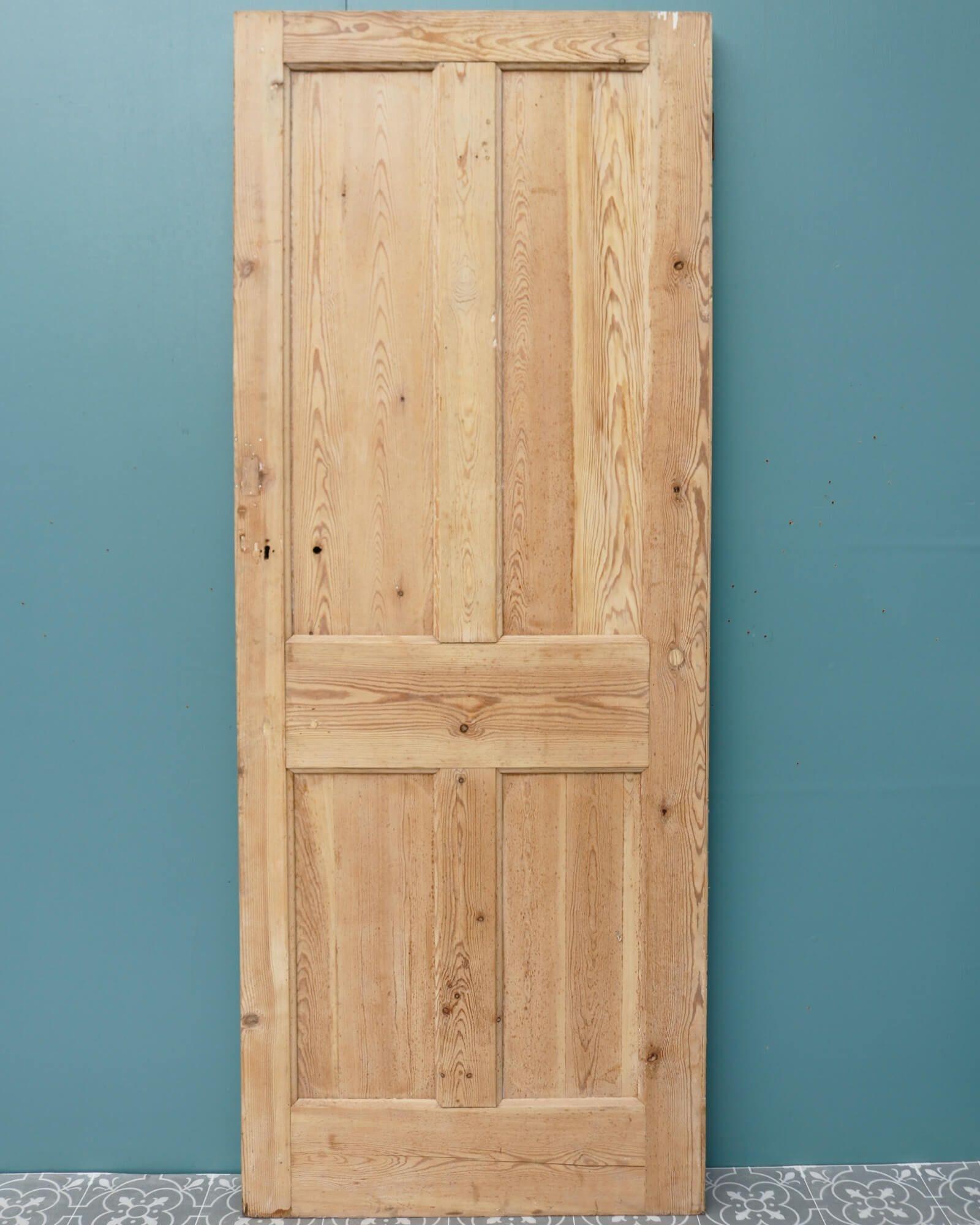 A smart reclaimed 2-panel Georgian style internal door dating from the 1890s. This antique door has an unusual design with 2 raised and fielded panels to the front while the back is a standard 4 panels. Made in pine, this internal door is stripped
