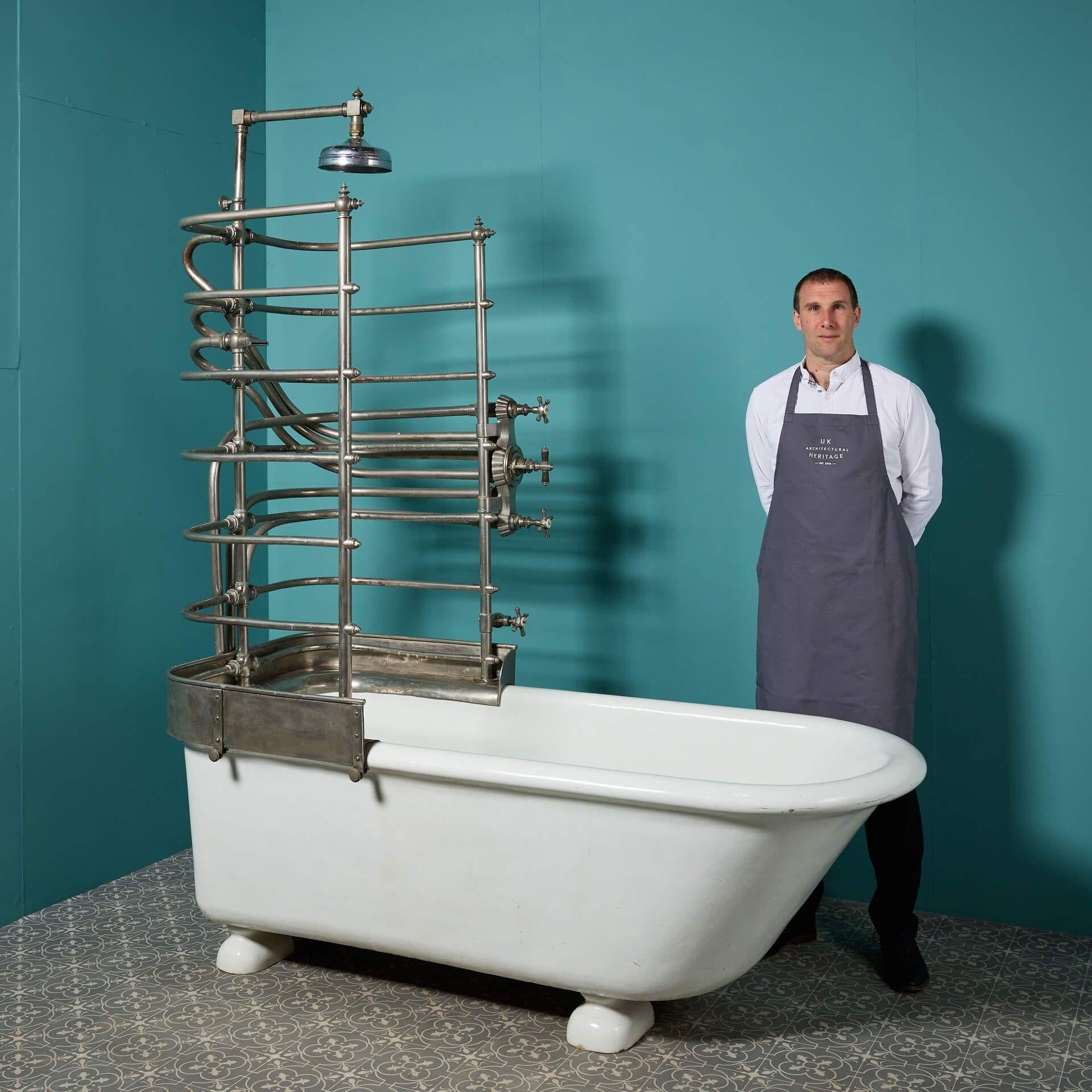 A very unusual antique canopy bath and shower, reclaimed from a large private house in London. This glazed earthenware bath is made by Rufford & Co with metal components by Low & Duff Ltd, Edinburgh. Previously situated in a wet room, this