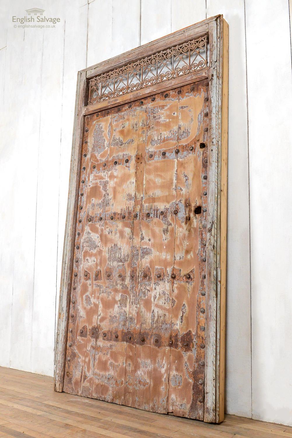 African Reclaimed Antique Moroccan Door in Frame, 20th Century For Sale