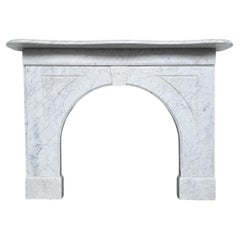 Reclaimed arched Victorian Carrara marble fireplace surround
