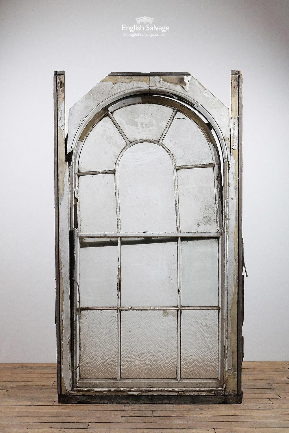 Reclaimed large arched sash window in pine frame with an oak sill. Clear and dimpled glass. Needs attention as shown in photos. One of a selection salvaged from the same property. Measurements below (+/- 5cm) are the external overall of each of the