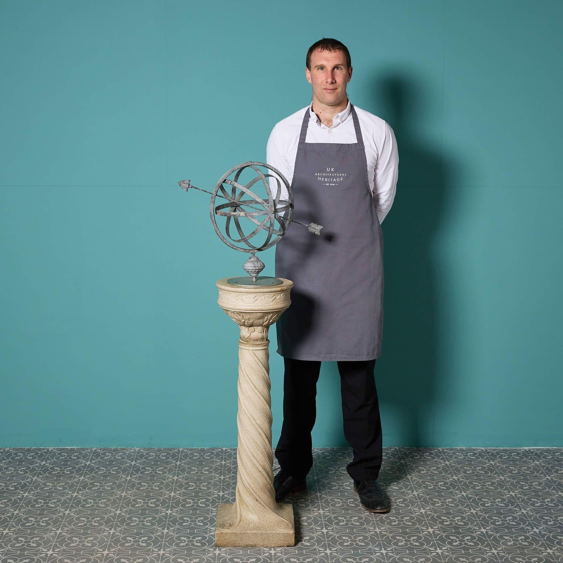 A reclaimed armillary sundial on a Doulton Lambeth glazed stoneware pedestal.

Add style to your garden with this reclaimed neoclassical style armillary sundial as it features an associated late 20th century garden armillary sphere above a mottled