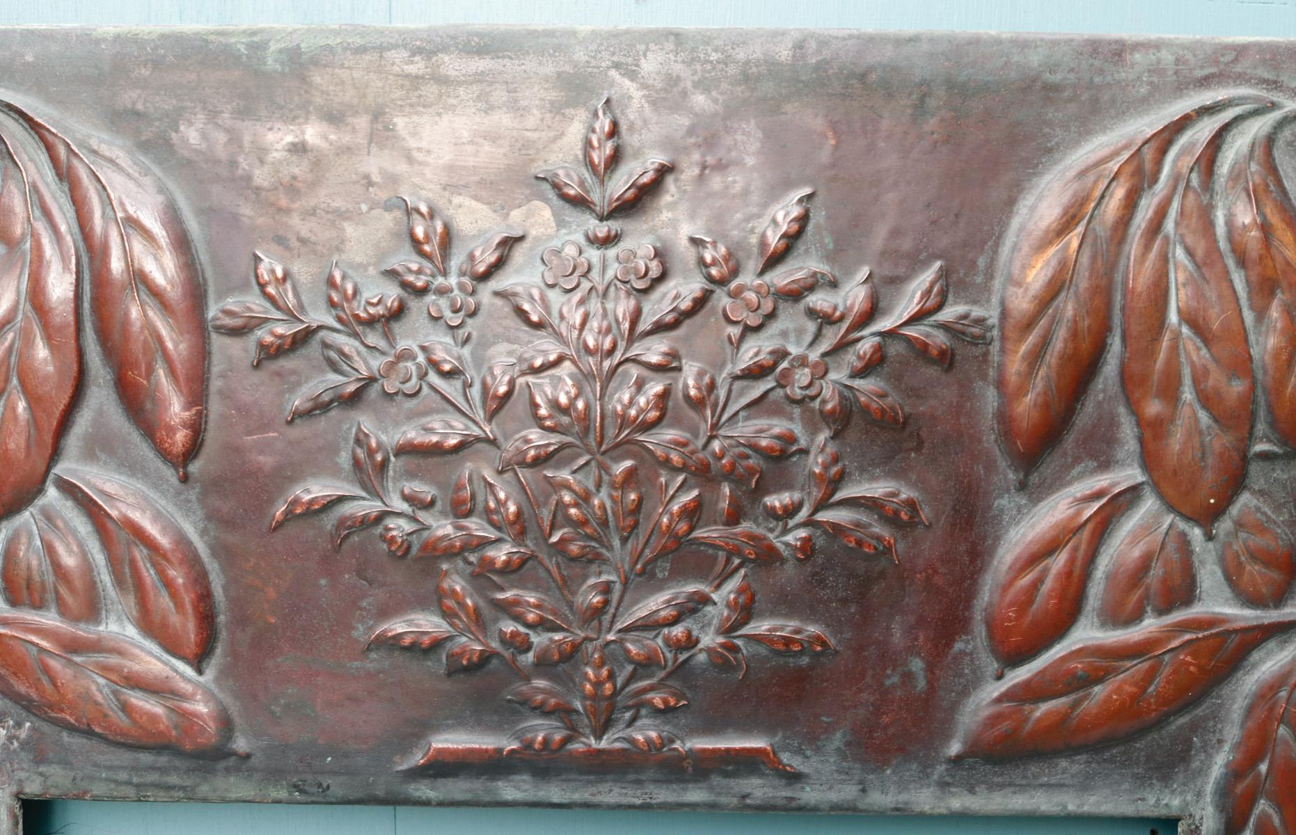 A reclaimed Arts & Crafts style copper insert with repoussé foliage decoration.

We have another similar insert available.

Additional dimensions
Opening height 75 cm
Opening width 48.5 cm.
  