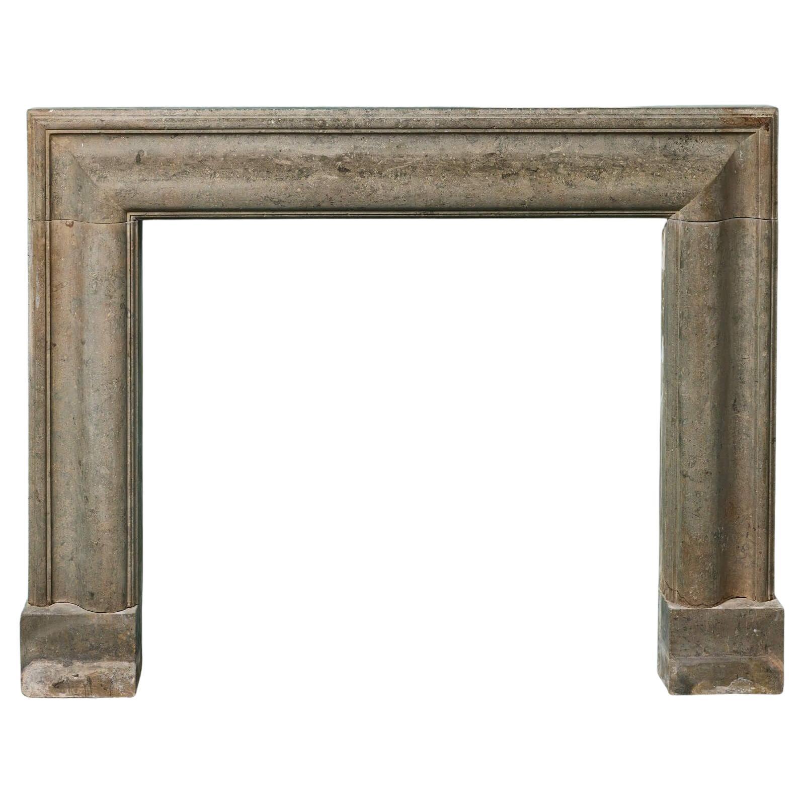 Reclaimed Bolection Style Limestone Fire Mantel For Sale