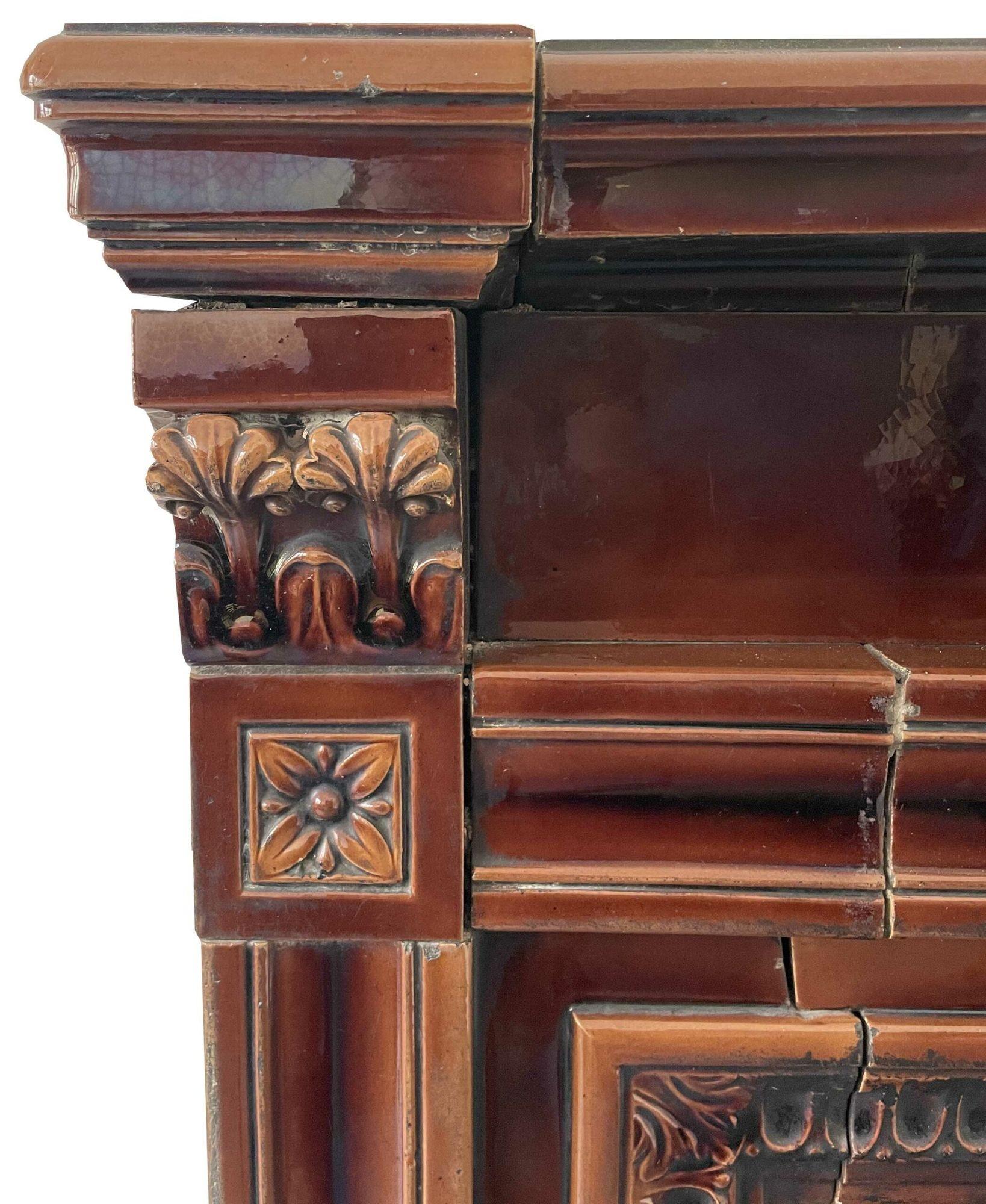 This is one of three similar antique fire mantels recently salvaged from a property in the East of England. It is most likely made by Doulton. It features a two-tone brown glaze.
 
Please note that the opening is straight and complete. The images