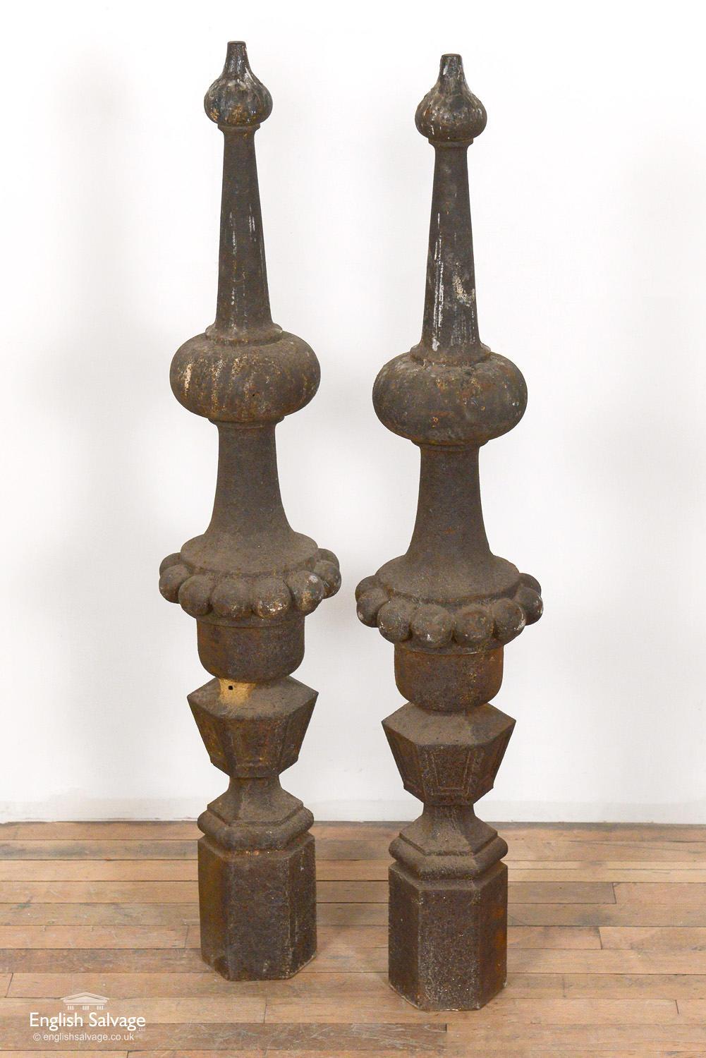 Reclaimed rusted cast iron finials with hexagonal bases. One post has two splits, as shown in the photos.