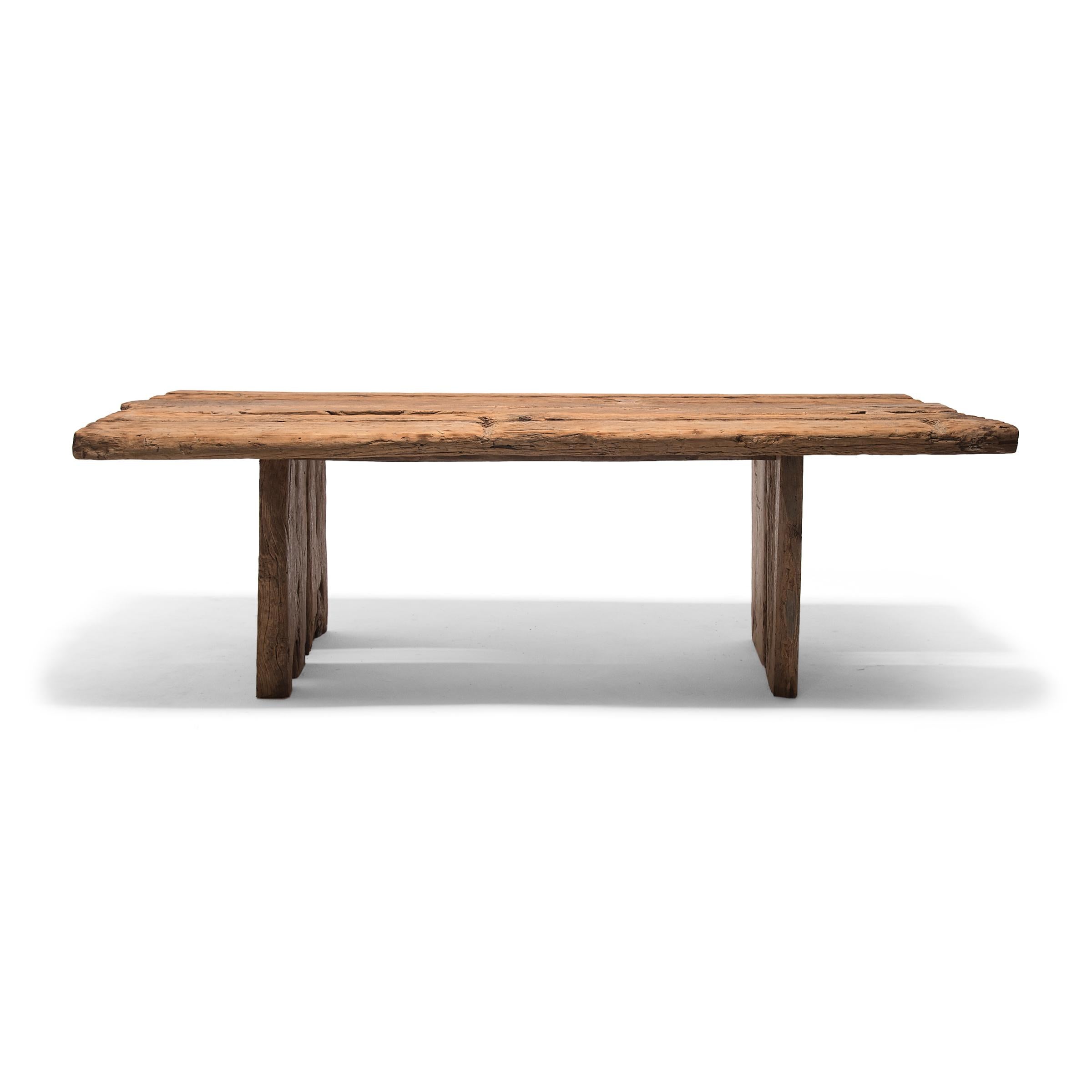 Made of wood reclaimed from Qing-dynasty architecture, this contemporary dining table is a celebration of wabi-sabi style. The clean lines highlight every knot, split, groove, and color variation in our expressive 18th century elmwood